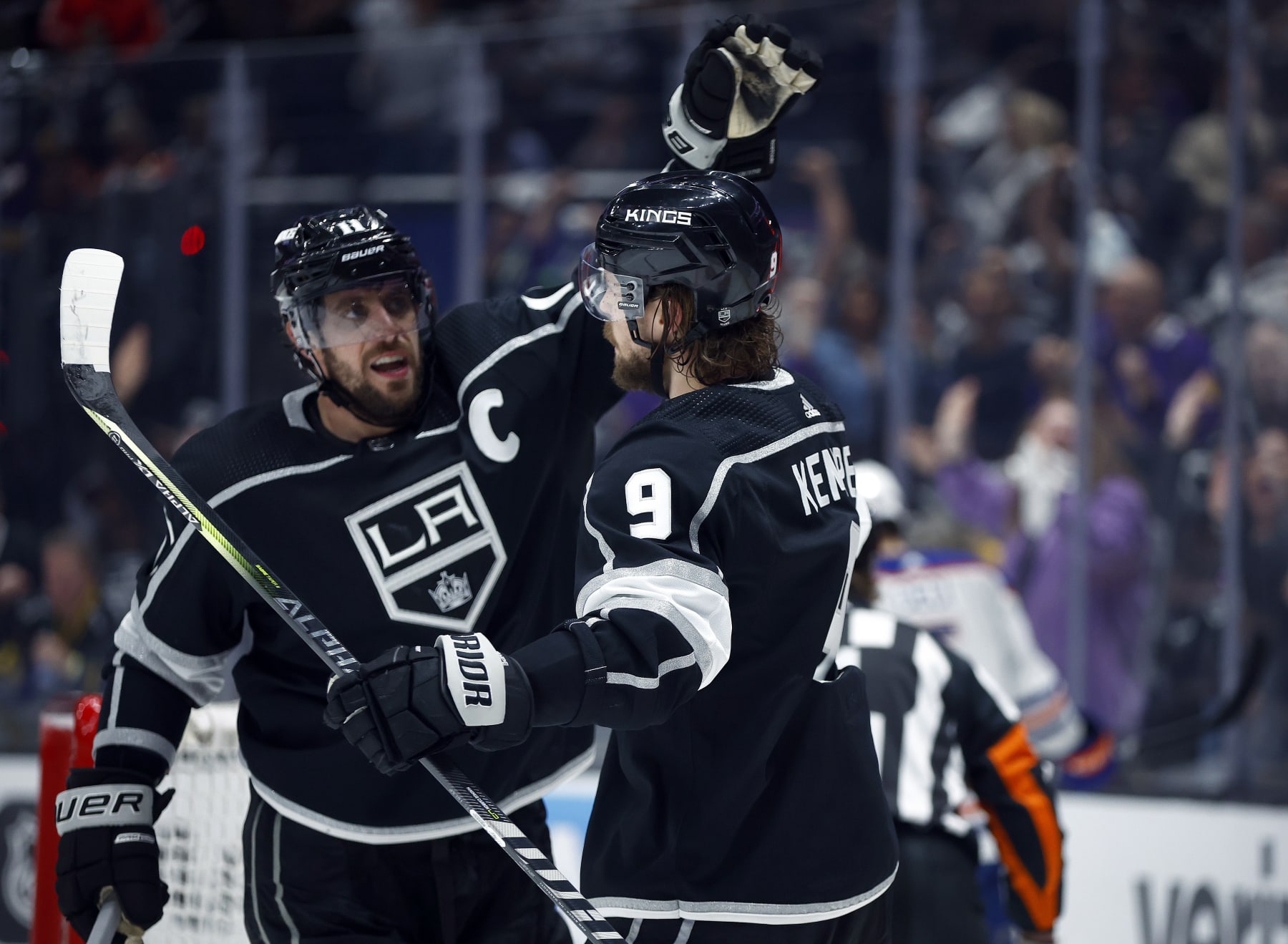 LOS ANGELES, CALIFORNIA - APRIL 29:  Anze Kopitar #11 and Adrian Kempe #9 of the Los Angeles Kings celebrate a goal against the Edmonton Oilers during the second period in Game Six of the First Round of the 2023 Stanley Cup Playoffs at Crypto.com Arena on April 29, 2023 in Los Angeles, California. (Photo by Ronald Martinez/Getty Images)