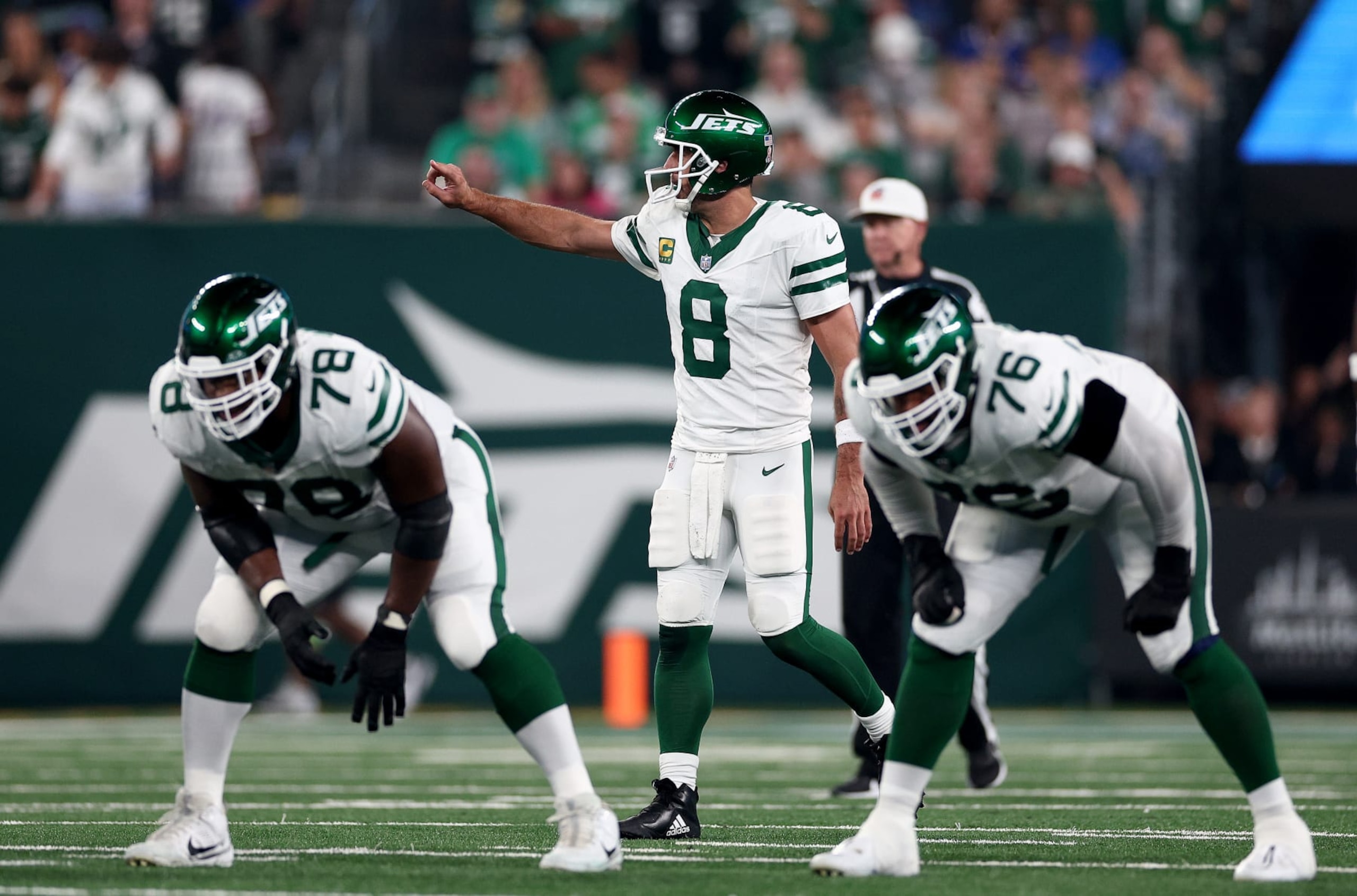 EAST RUTHERFORD, NEW JERSEY - SEPTEMBER 11: Aaron Rodgers #8 of the New York Jets calls out the play in the first quarter against the Buffalo Bills at MetLife Stadium on September 11, 2023 in East Rutherford, New Jersey. (Photo by Elsa/Getty Images) EAST RUTHERFORD, NEW JERSEY - SEPTEMBER 11: Aaron Rodgers #8 of the New York Jets calls out the play in the first quarter against the Buffalo Bills at MetLife Stadium on September 11, 2023 in East Rutherford, New Jersey. (Photo by Elsa/Getty Images)