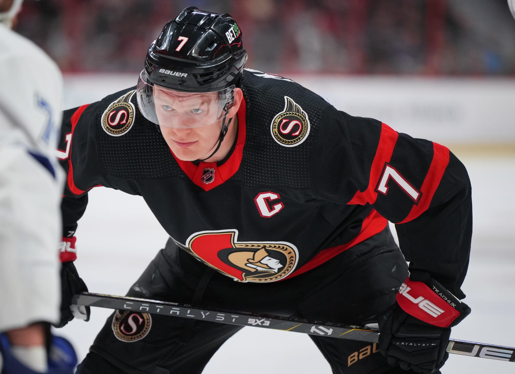 OTTAWA, CANADA - APRIL 8:  Brady Tkachuk #7 of the Ottawa Senators prepares for a face-off against the Tampa Bay Lightning at Canadian Tire Centre on April 8, 2023 in Ottawa, Ontario, Canada.  (Photo by André Ringuette/NHLI via Getty Images)