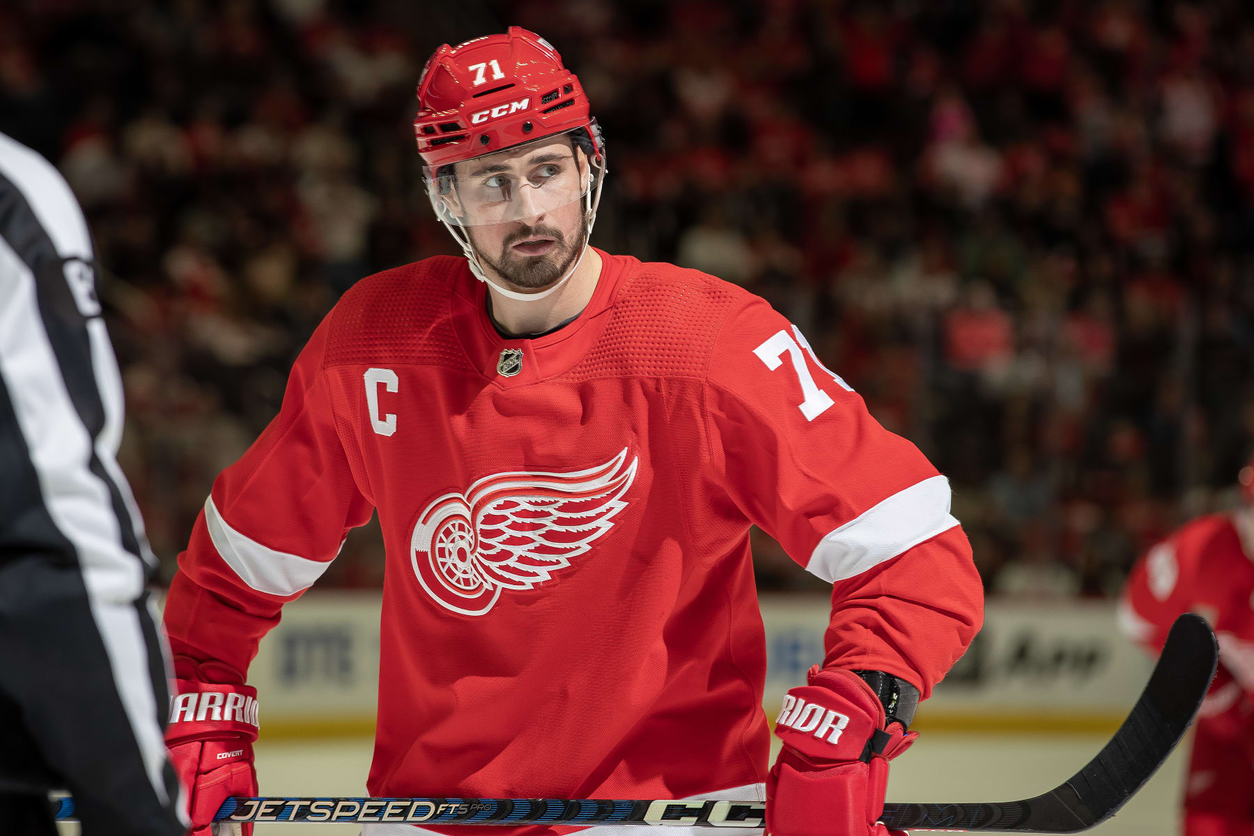 DETROIT, MI - MARCH 30: Dylan Larkin #71 of the Detroit Red Wings gets set for the face-off against the Carolina Hurricanes during the third period of an NHL game at Little Caesars Arena on March 30, 2023 in Detroit, Michigan. Detroit defeated Carolina 3-2. (Photo by Dave Reginek/NHLI via Getty Images)