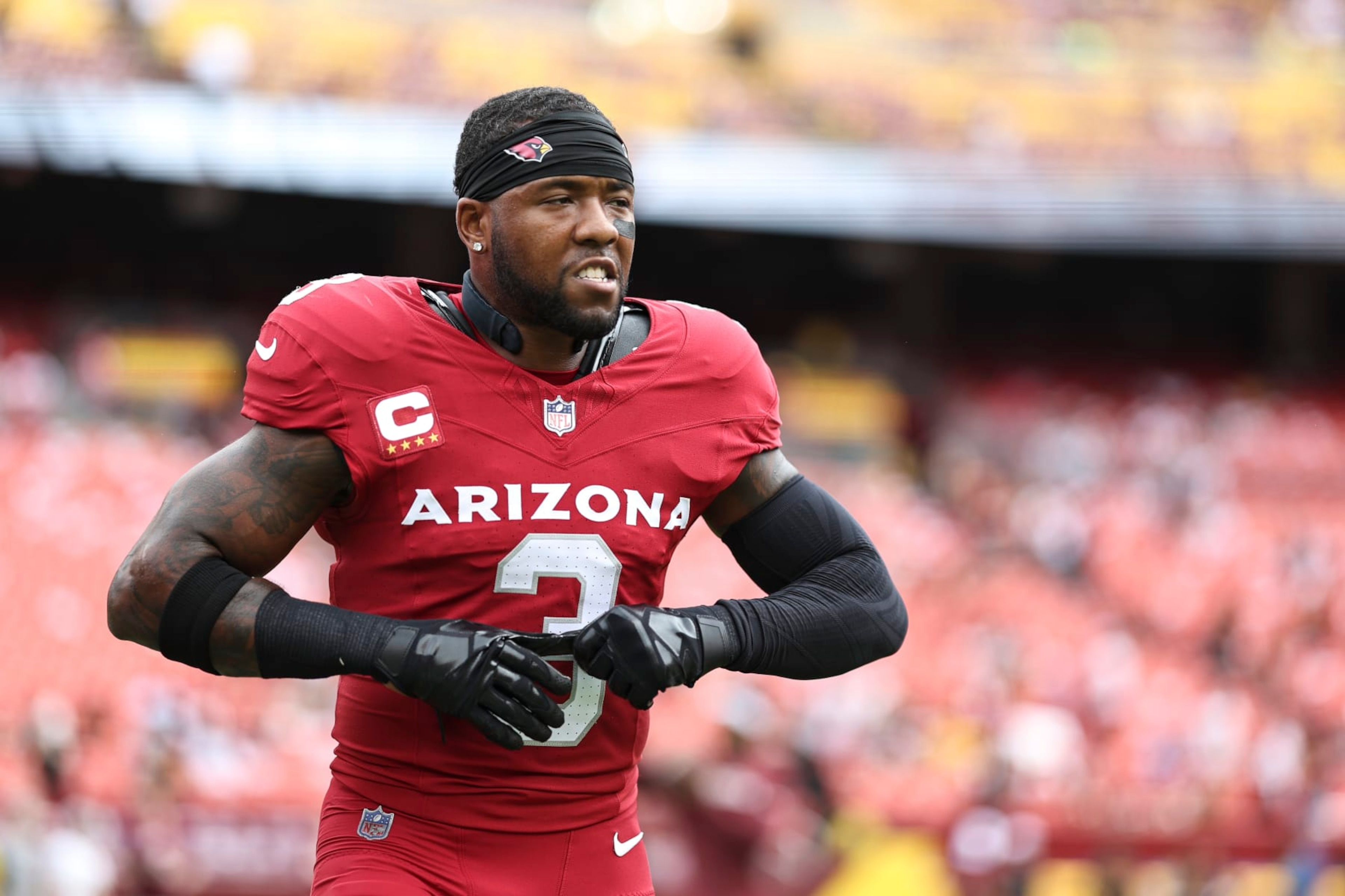 LANDOVER, MARYLAND - SEPTEMBER 10: Budda Baker #3 of the Arizona Cardinals reacts as he warms up prior to a game against the Washington Commanders at FedExField on September 10, 2023 in Landover, Maryland. (Photo by Michael Owens/Getty Images)