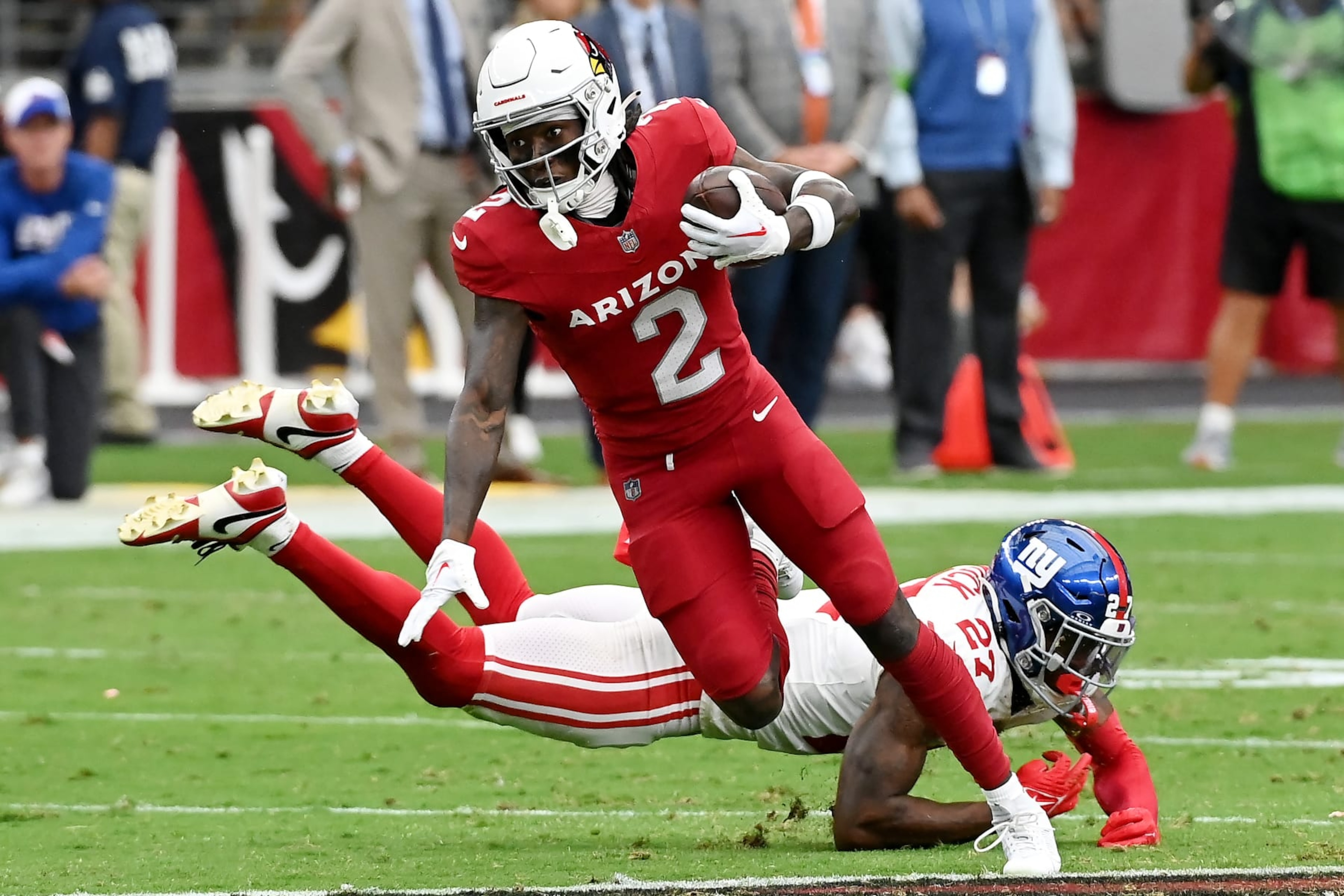 GLENDALE, ARIZONA - SEPTEMBER 17: Marquise Brown #2 of the Arizona Cardinals avoids a tackle from Jason Pinnock #27 of the New York Giants during the second quarter at State Farm Stadium on September 17, 2023 in Glendale, Arizona. (Photo by Norm Hall/Getty Images) GLENDALE, ARIZONA - SEPTEMBER 17: Marquise Brown #2 of the Arizona Cardinals avoids a tackle from Jason Pinnock #27 of the New York Giants during the second quarter at State Farm Stadium on September 17, 2023 in Glendale, Arizona. (Photo by Norm Hall/Getty Images)