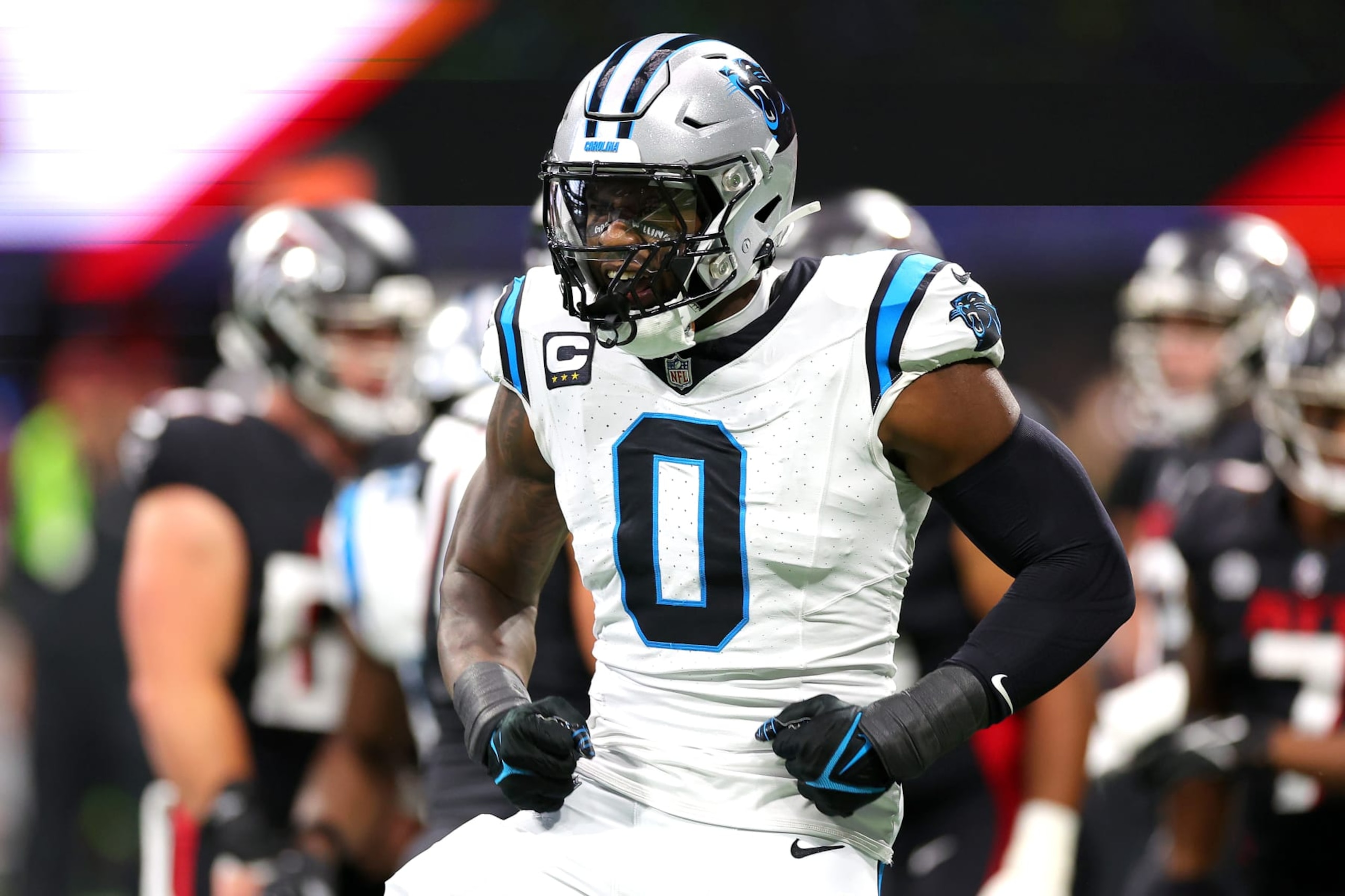ATLANTA, GEORGIA - SEPTEMBER 10: Brian Burns #0 of the Carolina Panthers reacts after forcing a fumble during the first quarter against the Atlanta Falcons at Mercedes-Benz Stadium on September 10, 2023 in Atlanta, Georgia. (Photo by Kevin C. Cox/Getty Images)