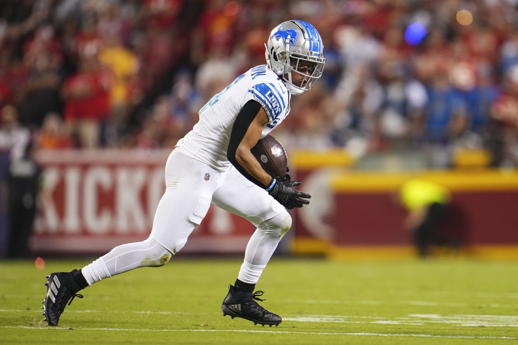 KANSAS CITY, MO - SEPTEMBER 07: Amon-Ra St. Brown #14 of the Detroit Lions runs the ball during at GEHA Field at Arrowhead Stadium on September 7, 2023 in Kansas City, Missouri. (Photo by Cooper Neill/Getty Images)