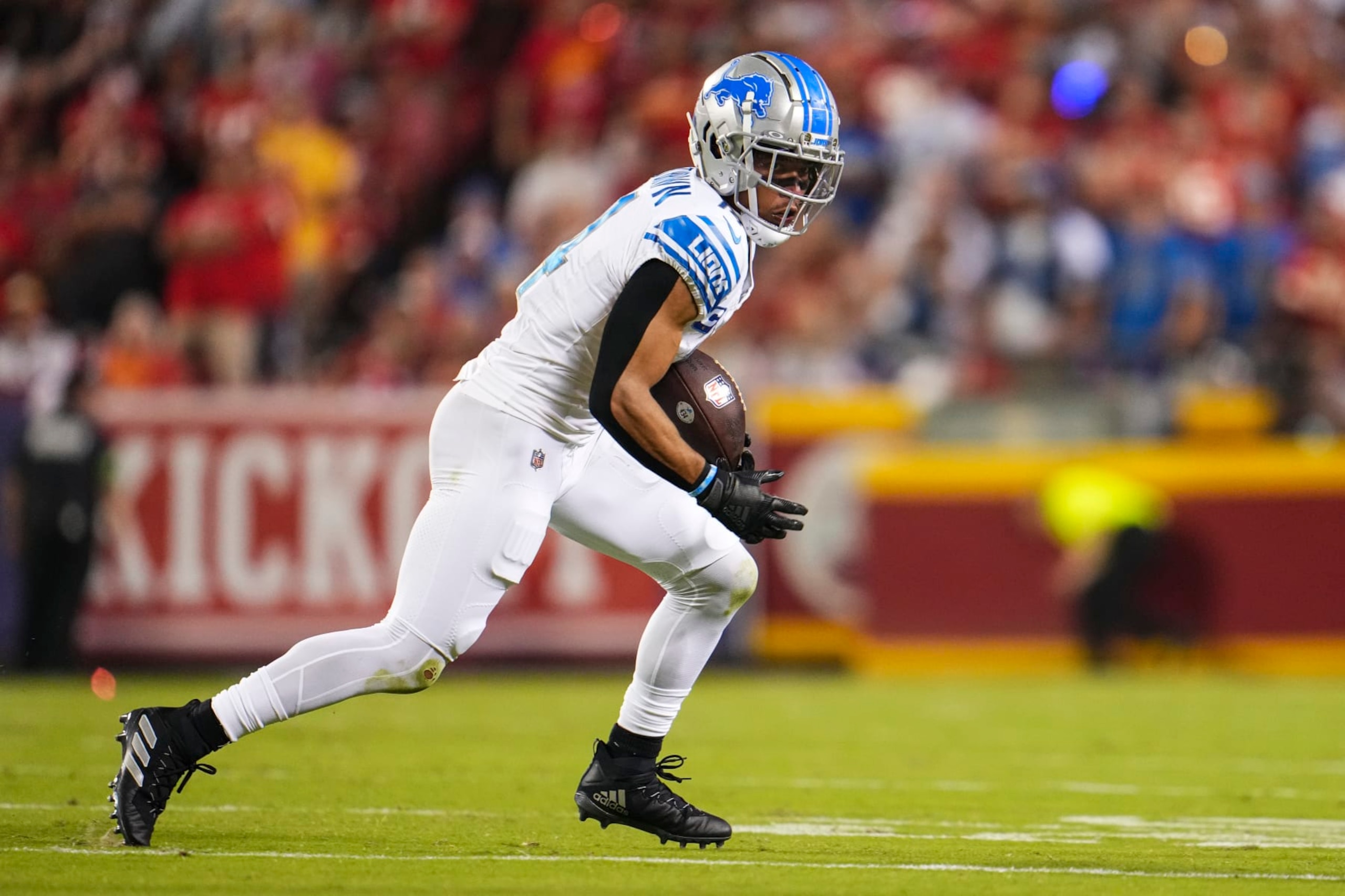 KANSAS CITY, MO - SEPTEMBER 07: Amon-Ra St. Brown #14 of the Detroit Lions runs the ball during at GEHA Field at Arrowhead Stadium on September 7, 2023 in Kansas City, Missouri. (Photo by Cooper Neill/Getty Images)