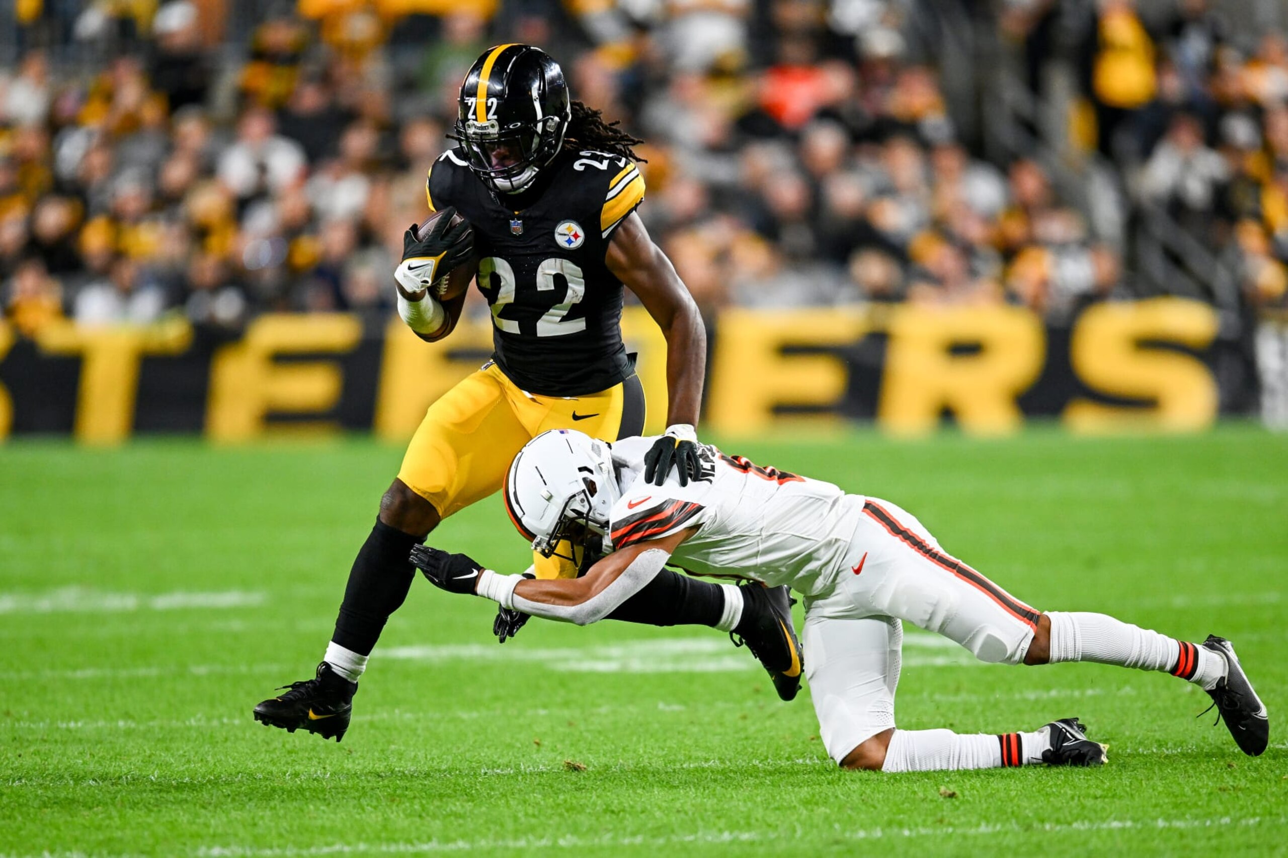 PITTSBURGH, PENNSYLVANIA - SEPTEMBER 18:  Najee Harris #22 of the Pittsburgh Steelers carries the ball against Greg Newsome II #0 of the Cleveland Browns during the second quarter at Acrisure Stadium on September 18, 2023 in Pittsburgh, Pennsylvania. (Photo by Joe Sargent/Getty Images)