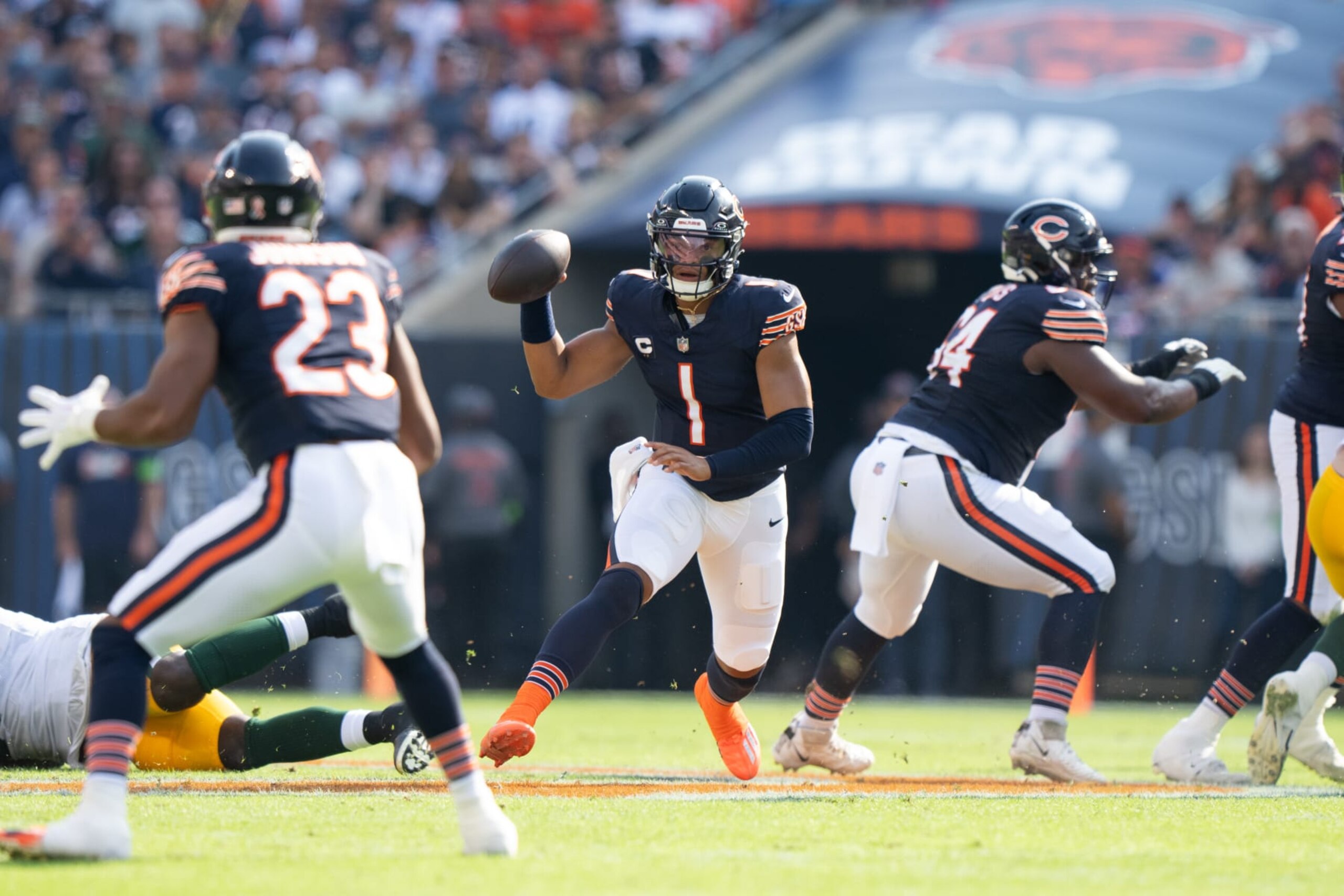 CHICAGO, IL - SEPTEMBER 10:  Quarterback Justin Fields #1 of the Chicago Bears looks to throw the ball during an NFL football game against the Green Bay Packers at Soldier Field on September 10, 2023 in Chicago, Illinois. (Photo by Todd Rosenberg/Getty Images)