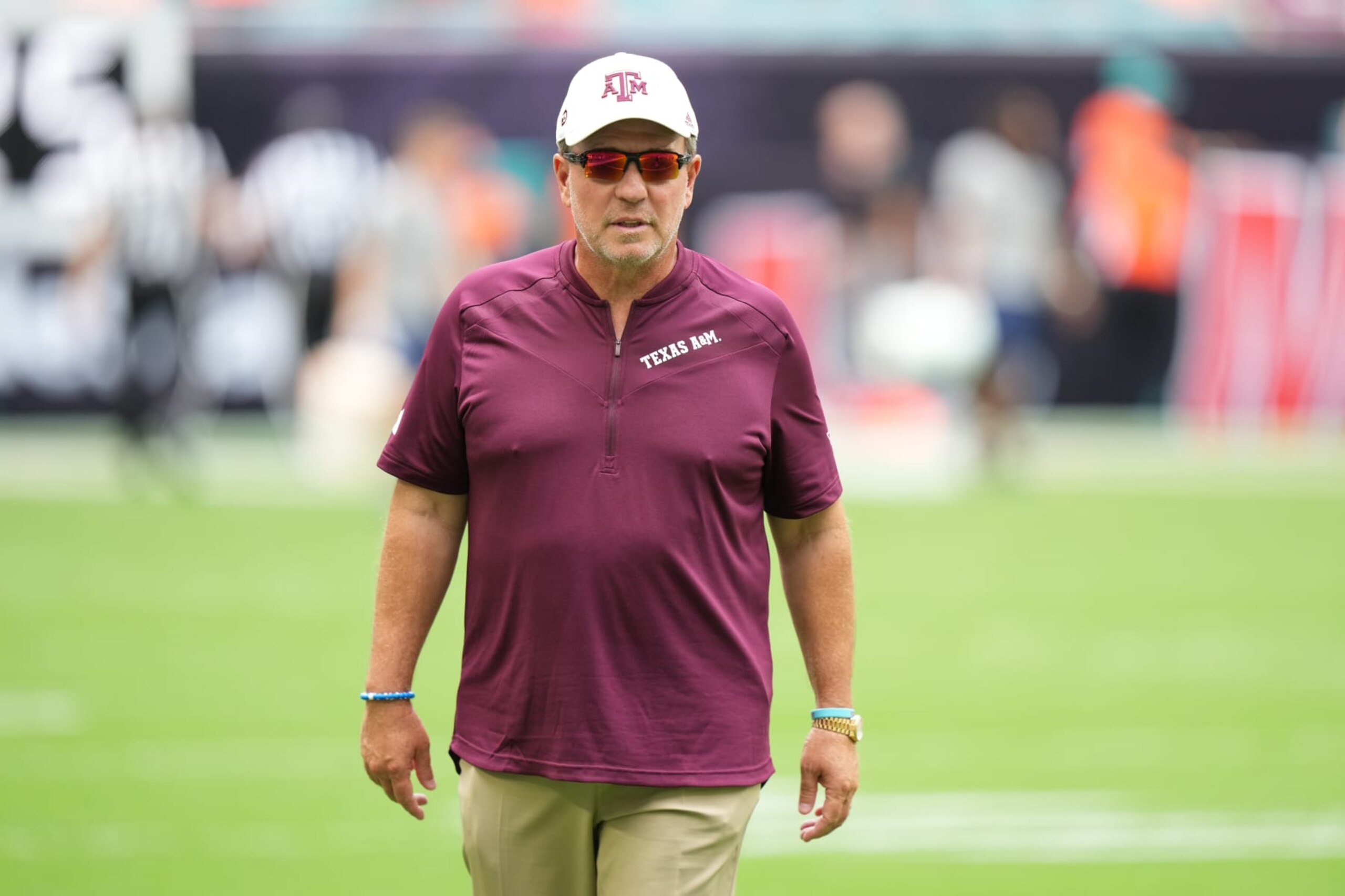 MIAMI GARDENS, FL - SEPTEMBER 09: Texas A&M Aggies head coach Jimbo Fisher walks the filed during pregame warmups before the game between the Texas A&M Aggies and the Miami Hurricanes on Saturday, Sept 9, 2023 at Hard Rock Stadium, Miami Gardens, Fla. (Photo by Peter Joneleit/Icon Sportswire via Getty Images)