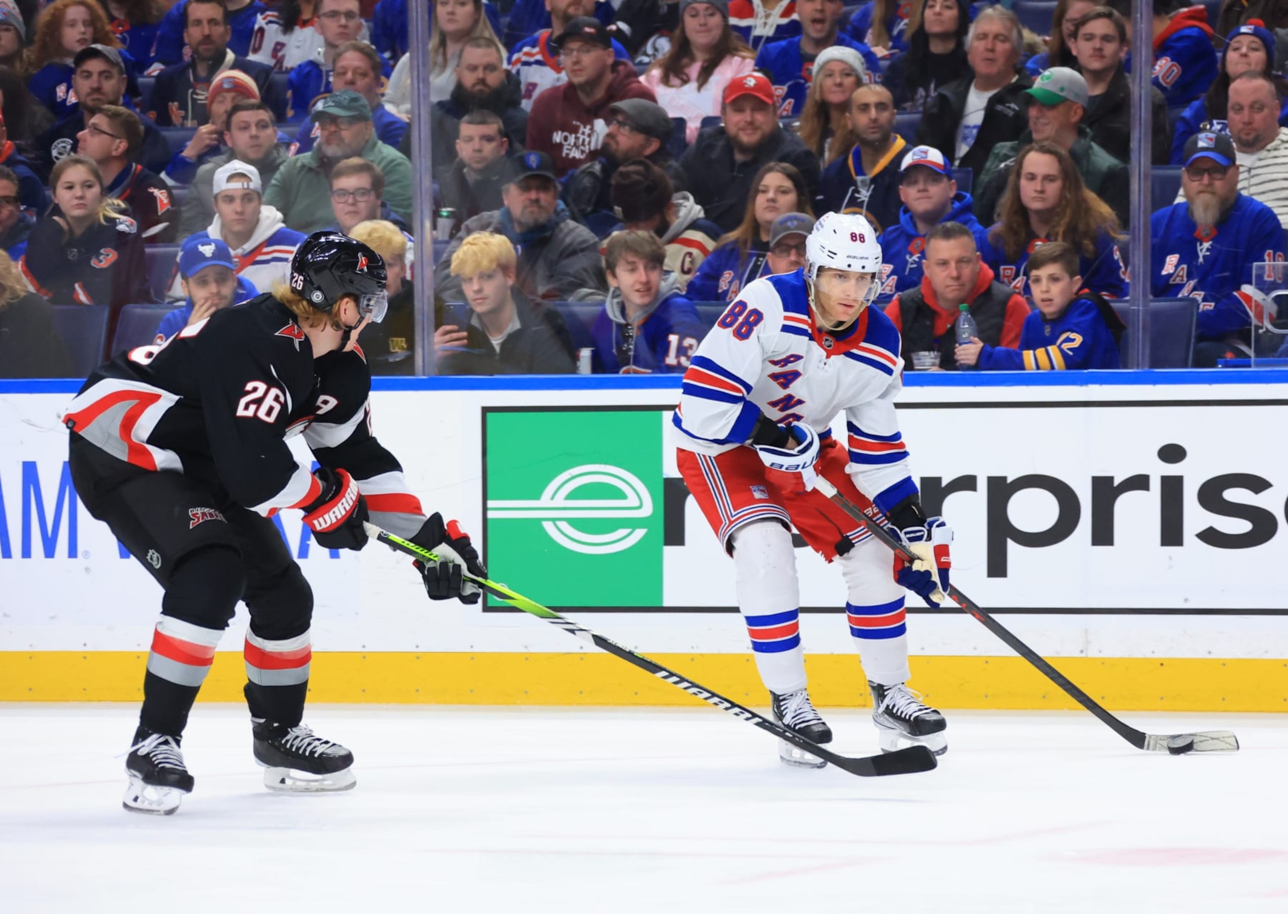 Buffalo Sabres defenseman Rasmus Dahlin (left) and former New York Rangers winger Patrick Kane. 
