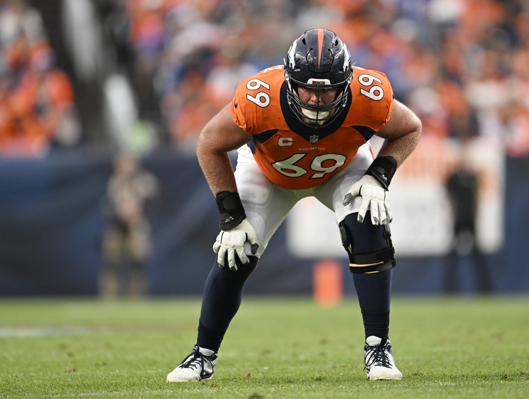 DENVER, COLORADO - AUGUST 10: Denver Broncos offensive tackle Mike McGlinchey (69) gets set for action at Empower Field on September 10, 2023 in Denver, Colorado. The Denver Broncos under new head coach Sean Payton lost 17 to 16 to divisional opponents the Las Vegas Raiders to start the 2023 NFL regular season. (Photo by RJ Sangosti/MediaNews Group/The Denver Post via Getty Images)