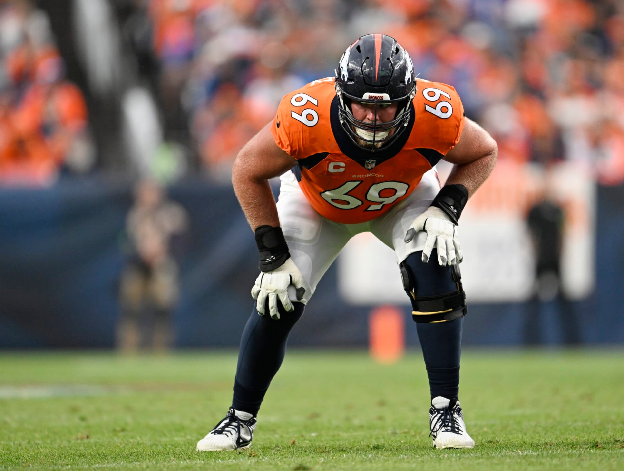 DENVER, COLORADO - AUGUST 10: Denver Broncos offensive tackle Mike McGlinchey (69) gets set for action at Empower Field on September 10, 2023 in Denver, Colorado. The Denver Broncos under new head coach Sean Payton lost 17 to 16 to divisional opponents the Las Vegas Raiders to start the 2023 NFL regular season. (Photo by RJ Sangosti/MediaNews Group/The Denver Post via Getty Images)