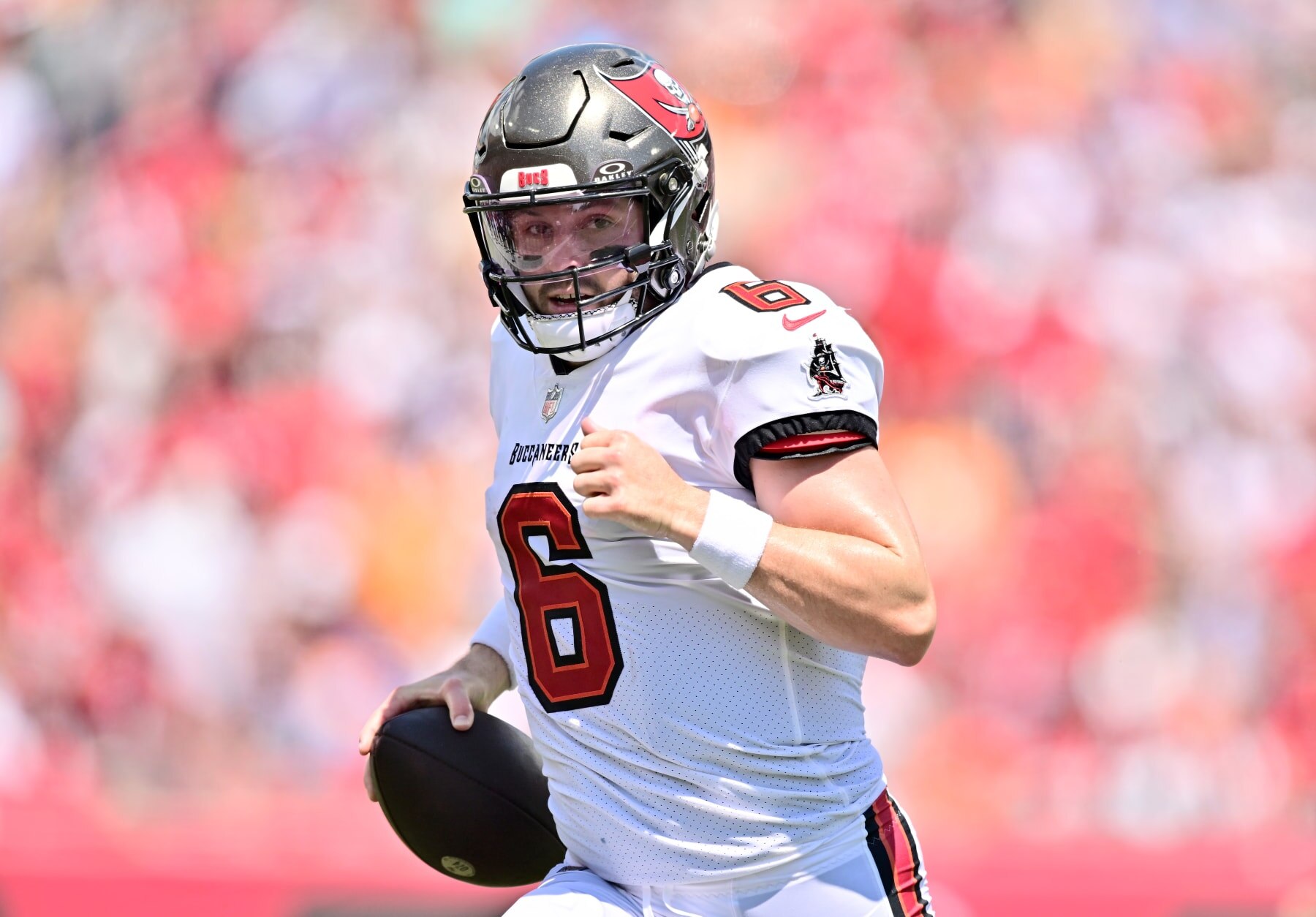 TAMPA, FLORIDA - SEPTEMBER 17: Baker Mayfield #6 of the Tampa Bay Buccaneers runs the ball during the first quarter against the Chicago Bears at Raymond James Stadium on September 17, 2023 in Tampa, Florida. (Photo by Julio Aguilar/Getty Images)