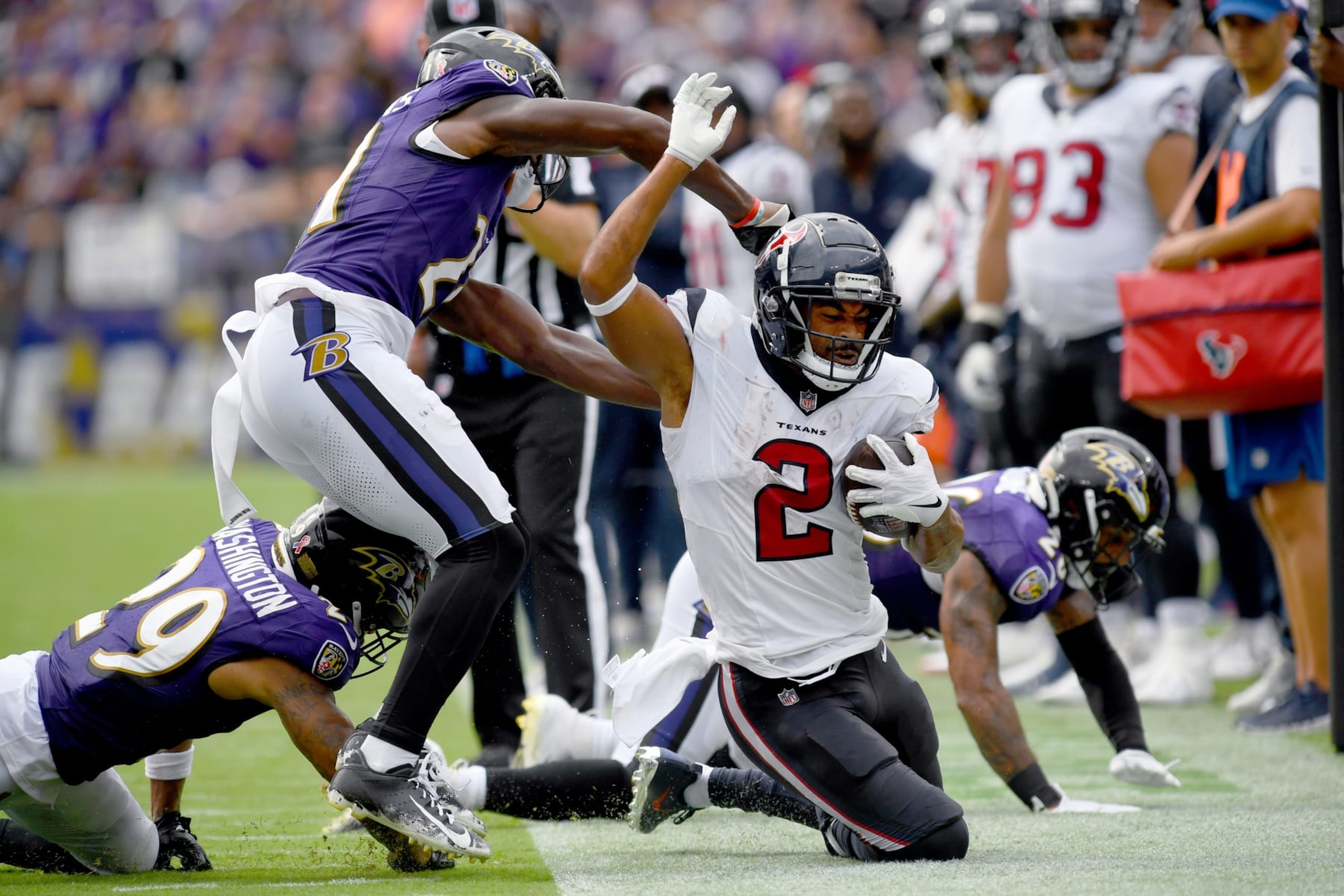 BALTIMORE, MD - SEPTEMBER 10: Texans wide receiver Robert Woods (2) is pushed out of bounds after a catch and run during the Houston Texans versus Baltimore Ravens NFL game at M&T Bank Stadium on September 10, 2023 in Baltimore, MD. (Photo by Randy Litzinger/Icon Sportswire via Getty Images)