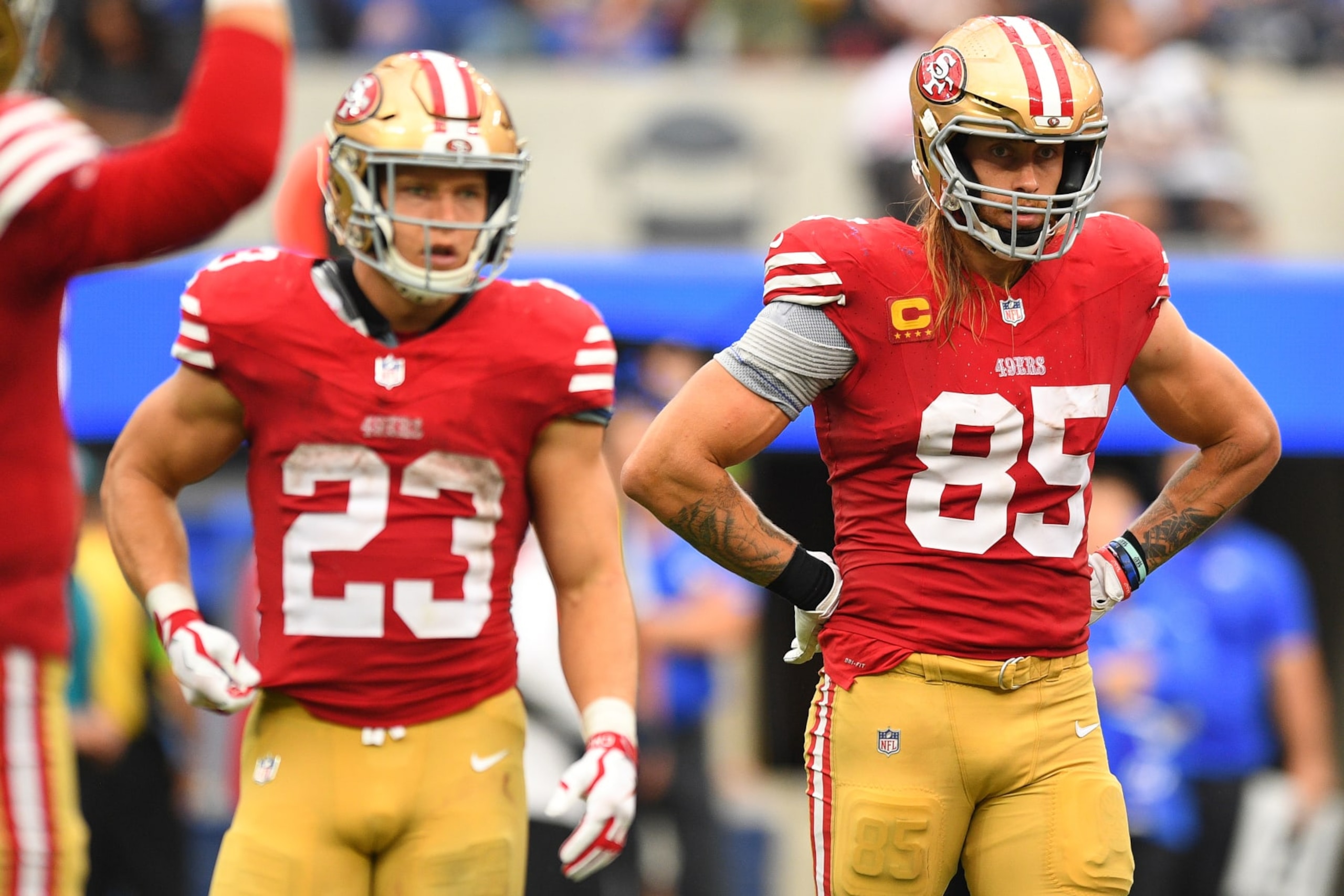 Christian McCaffrey and George Kittle of the 49ers