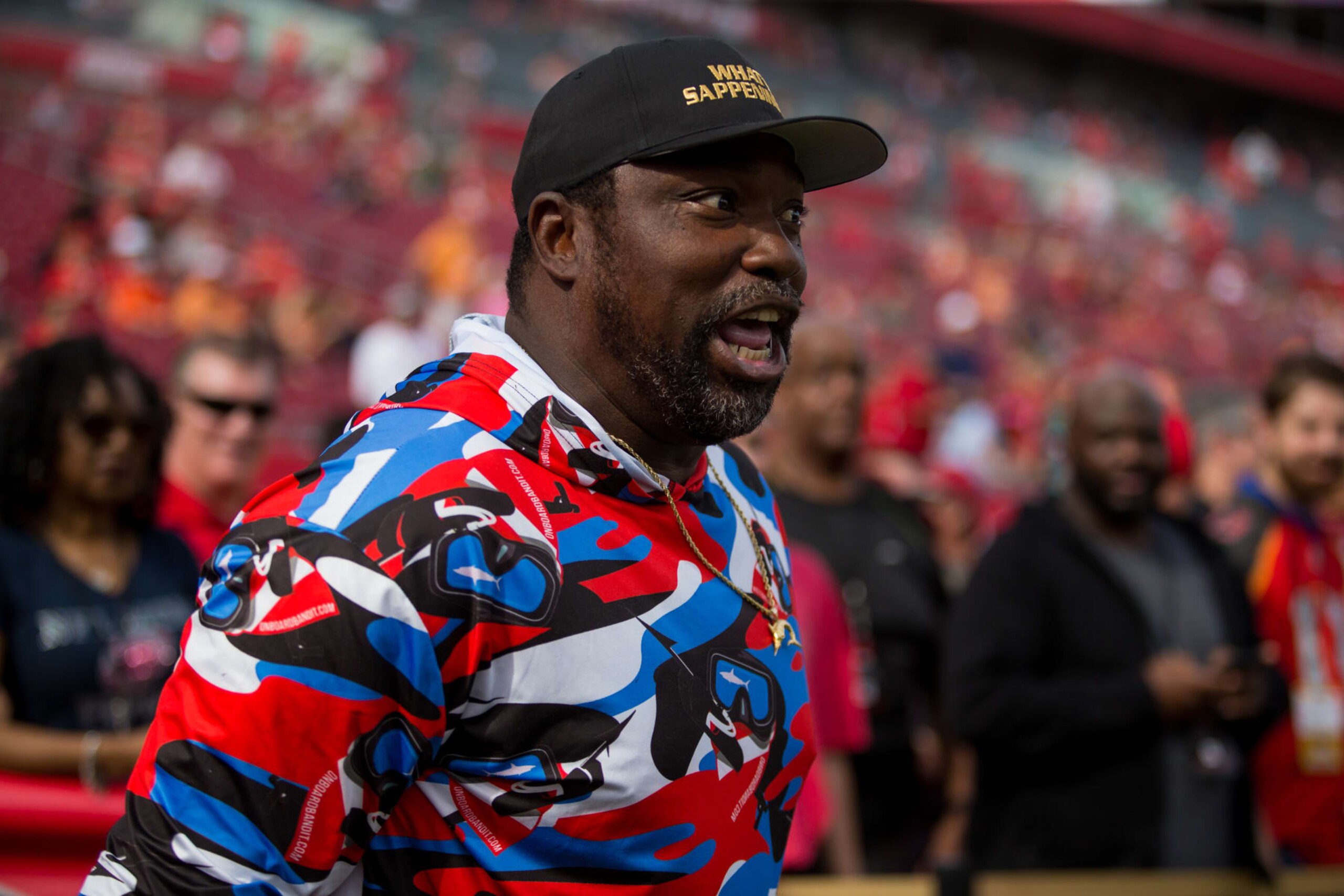 TAMPA, FL - DECEMBER 29:  Warren Sapp hypes up Tampa Bay players before the Tampa Bay Buccaneers game versus the Atlanta Falcons on December 29, 2019 at Raymond James Stadium in Tampa, FL. (Photo by Mary Holt/Icon Sportswire via Getty Images)