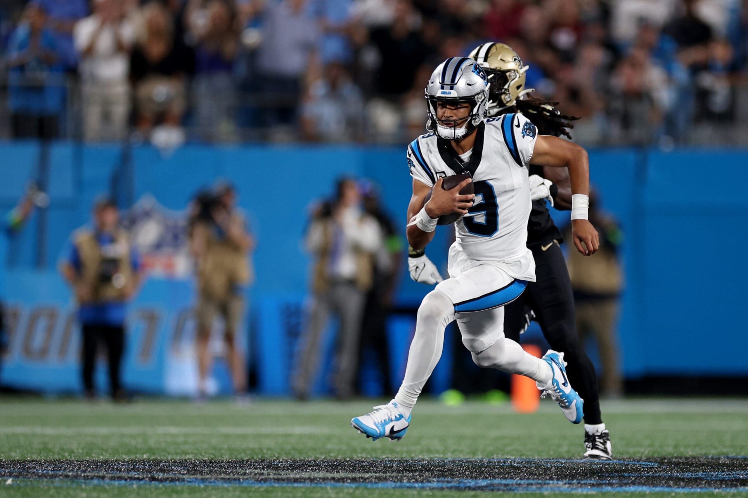 CHARLOTTE, NORTH CAROLINA - SEPTEMBER 18: Bryce Young #9 of the Carolina Panthers runs the ball against the New Orleans Saints during the fourth quarter in the game at Bank of America Stadium on September 18, 2023 in Charlotte, North Carolina. (Photo by Jared C. Tilton/Getty Images)