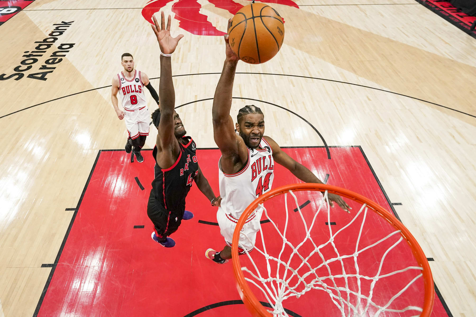 TORONTO, ON - APRIL 12: Patrick Williams #44 of the Chicago Bulls goes to the basket against Pascal Siakam #43 of the Toronto Raptors during the 2023 Play-In Tournament at the Scotiabank Arena on April 12, 2023 in Toronto, Ontario, Canada. NOTE TO USER: User expressly acknowledges and agrees that, by downloading and/or using this Photograph, user is consenting to the terms and conditions of the Getty Images License Agreement. (Photo by Andrew Lahodynskyj/Getty Images)