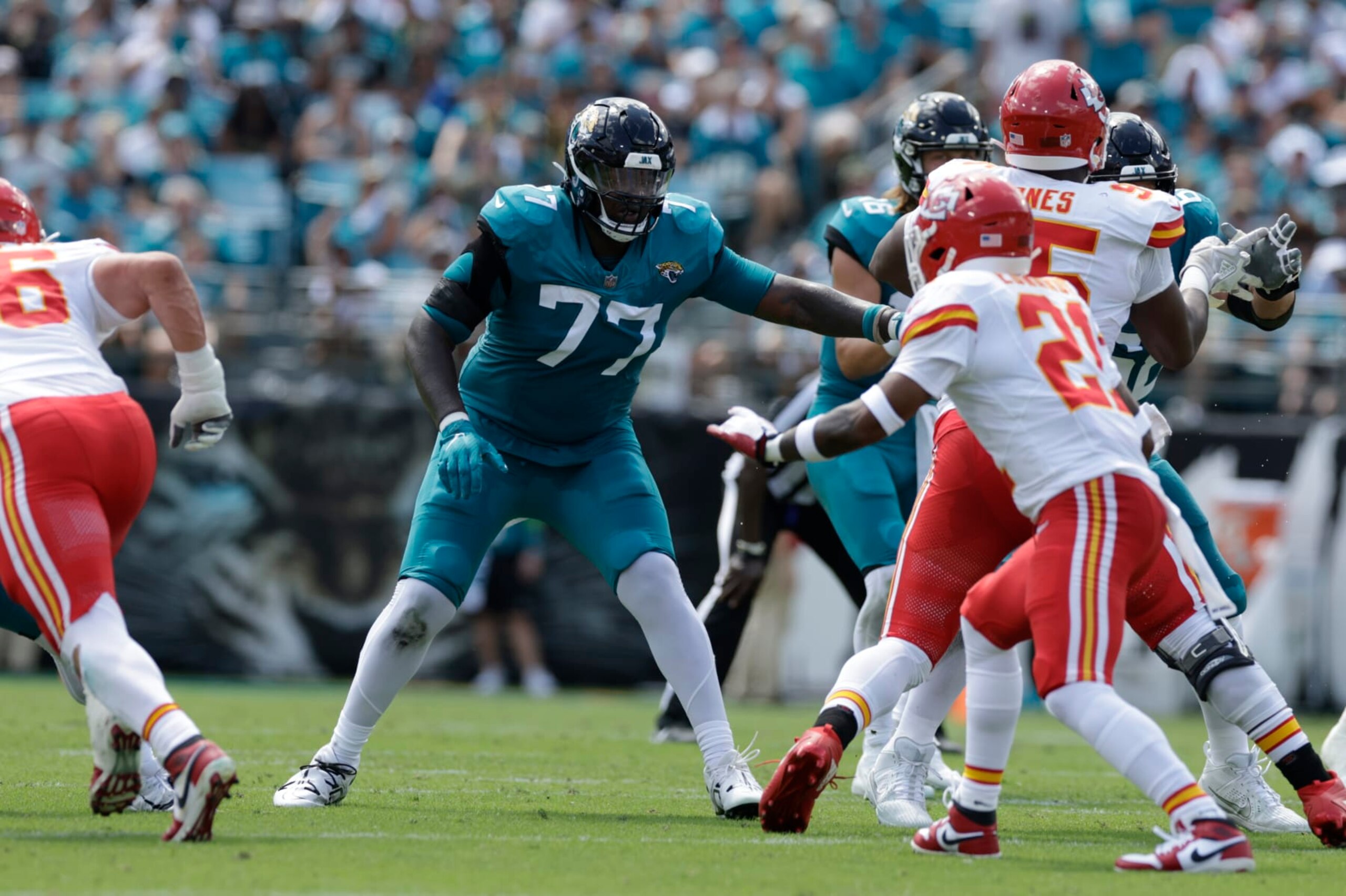 JACKSONVILLE, FL - SEPTEMBER 17: Jacksonville Jaguars offensive tackle Anton Harrison (77) blocks during the game between the Kansas City Chiefs and the Jacksonville Jaguars on September 17, 2023 at EverBank Stadium in Jacksonville, Fl. (Photo by David Rosenblum/Icon Sportswire via Getty Images)