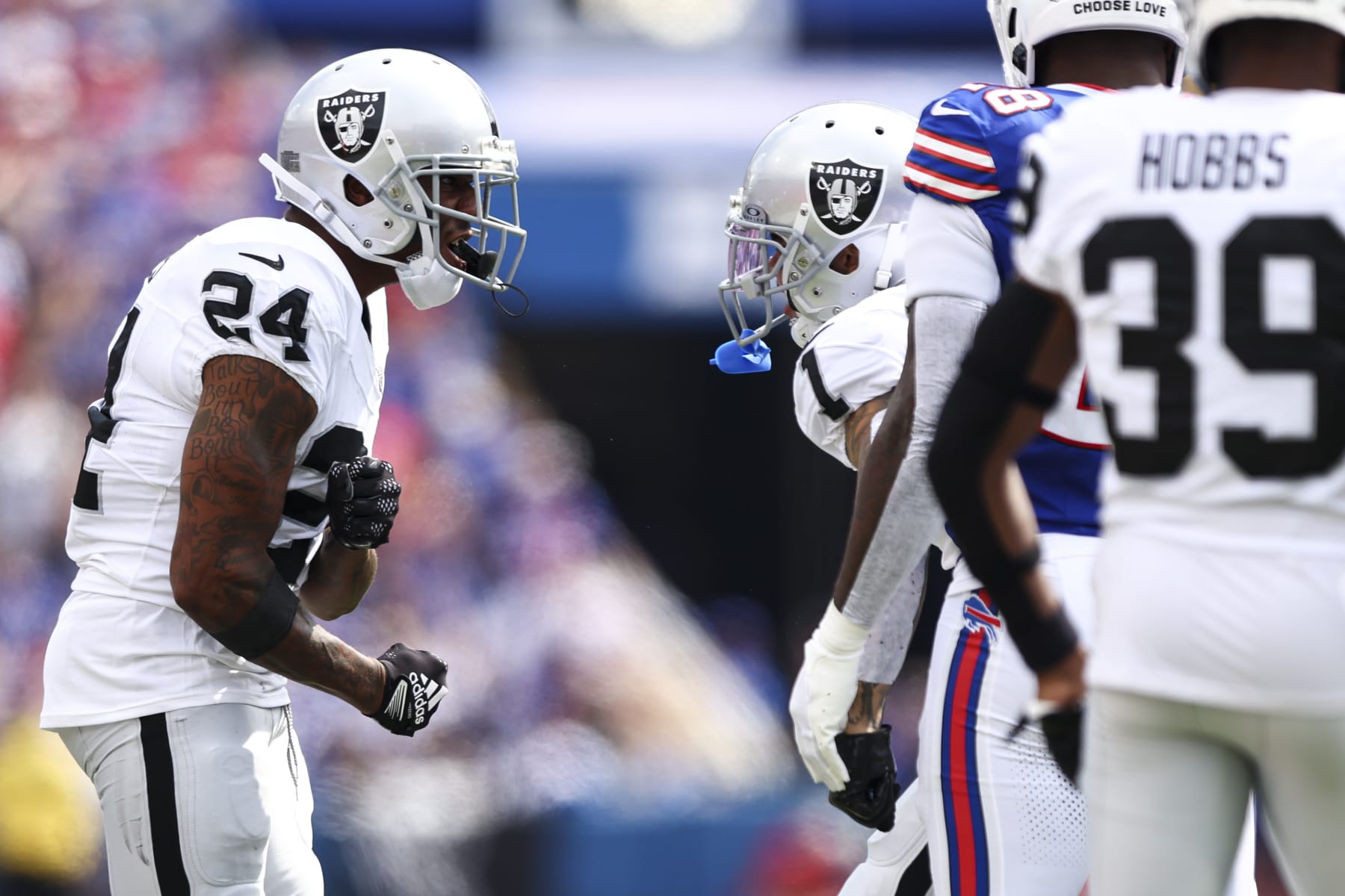 ORCHARD PARK, NY - SEPTEMBER 17: Marcus Peters #24 of the Las Vegas Raiders celebrates after a play during an NFL football game against the Buffalo Bills at Highmark Stadium on September 17, 2023 in Orchard Park, New York. (Photo by Kevin Sabitus/Getty Images)