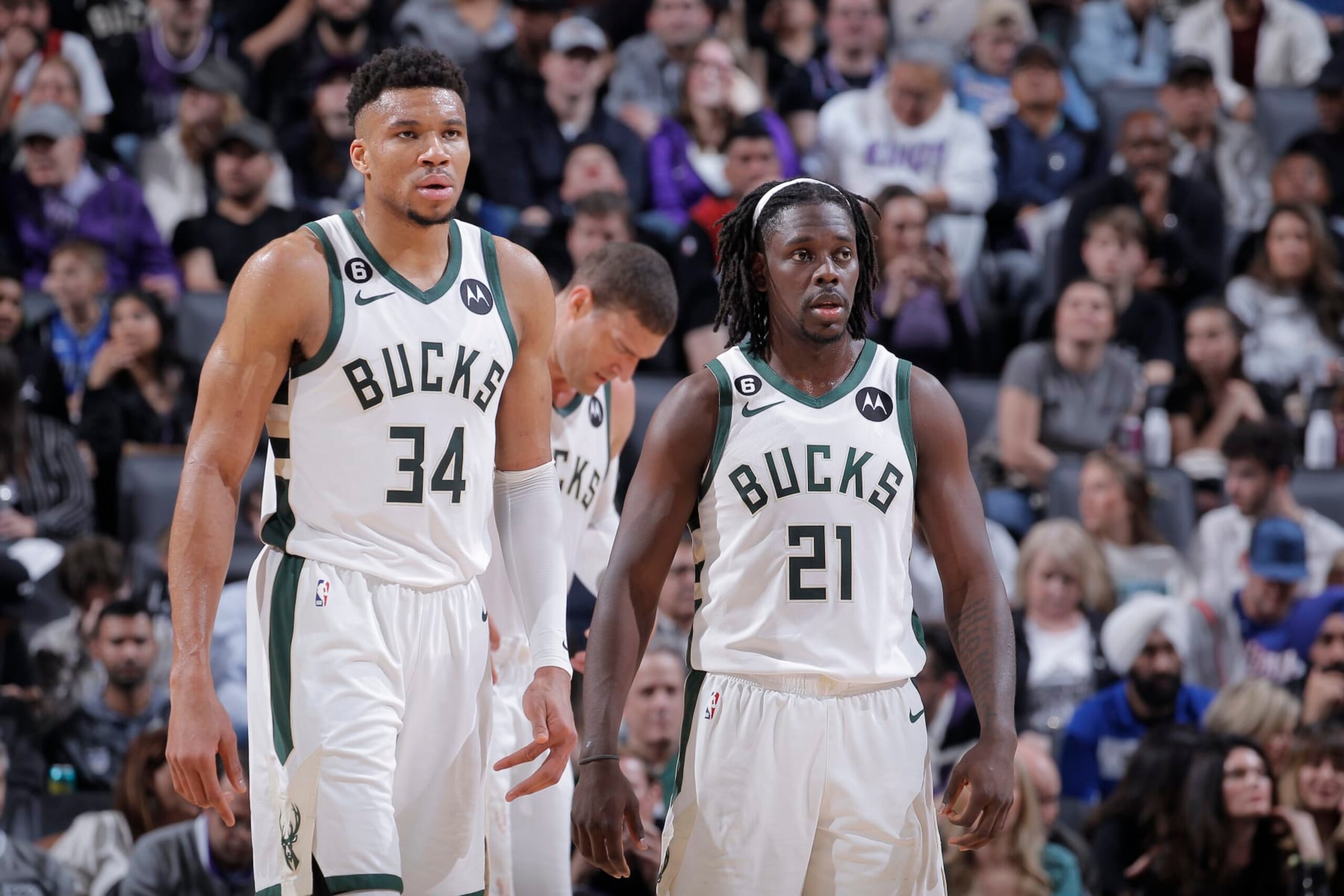 SACRAMENTO, CA - MARCH 13: Giannis Antetokounmpo #34 and Jrue Holiday #21 of the Milwaukee Bucks look on during the game against the Sacramento Kings on March 13, 2023 at Golden 1 Center in Sacramento, California. NOTE TO USER: User expressly acknowledges and agrees that, by downloading and or using this photograph, User is consenting to the terms and conditions of the Getty Images Agreement. Mandatory Copyright Notice: Copyright 2023 NBAE (Photo by Rocky Widner/NBAE via Getty Images) SACRAMENTO, CA - MARCH 13: Giannis Antetokounmpo #34 and Jrue Holiday #21 of the Milwaukee Bucks look on during the game against the Sacramento Kings on March 13, 2023 at Golden 1 Center in Sacramento, California. NOTE TO USER: User expressly acknowledges and agrees that, by downloading and or using this photograph, User is consenting to the terms and conditions of the Getty Images Agreement. Mandatory Copyright Notice: Copyright 2023 NBAE (Photo by Rocky Widner/NBAE via Getty Images)