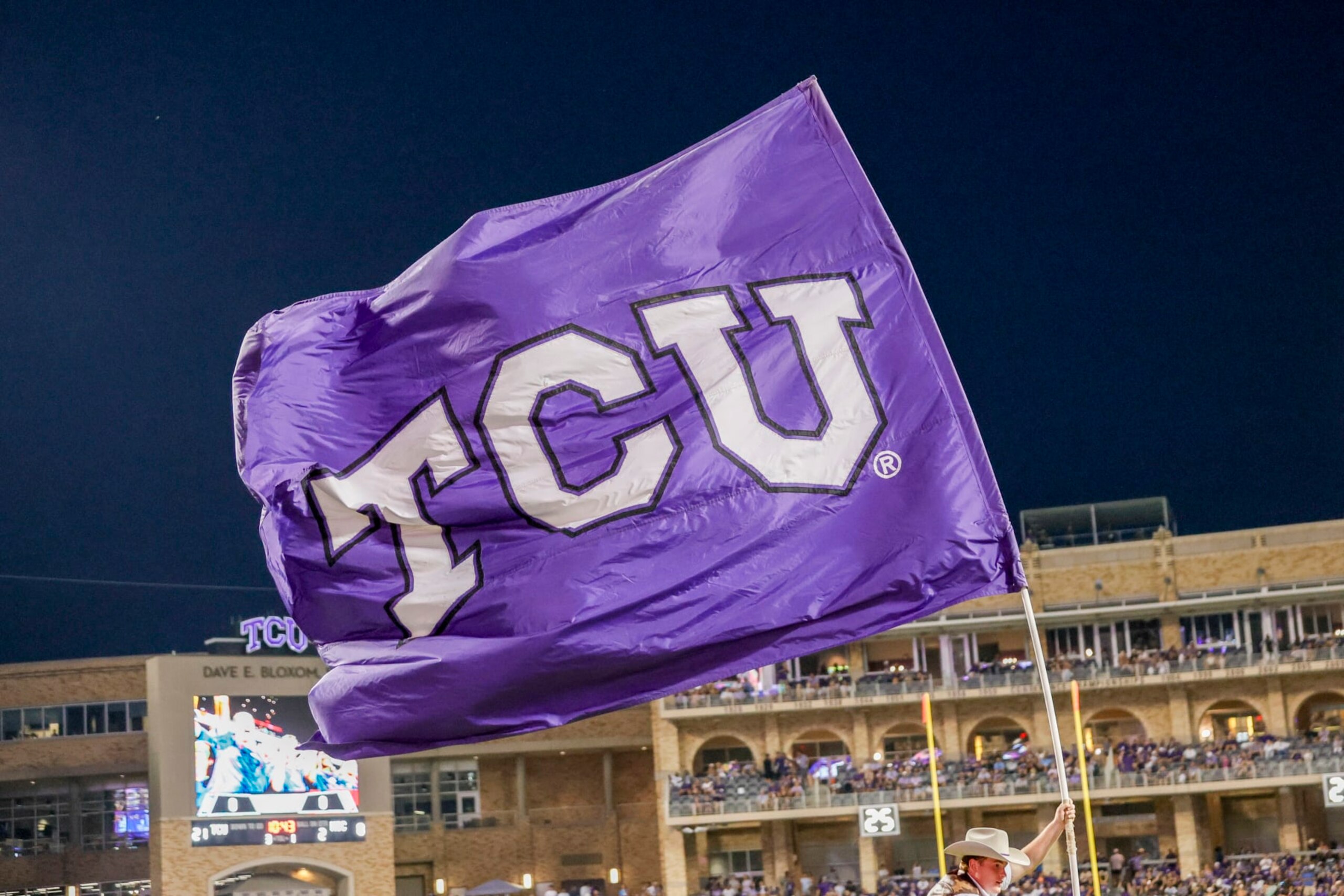 FORT WORTH, TX - SEPTEMBER 09: A TCU Horned Frogs flag flies after a touchdown during the game between the TCU Horned Frogs and the Nicholls State Colonels on September 9, 2013 at Amon G. Carter Stadium in Fort Worth, Tx. (Photo by Matthew Pearce/Icon Sportswire via Getty Images) FORT WORTH, TX - SEPTEMBER 09: A TCU Horned Frogs flag flies after a touchdown during the game between the TCU Horned Frogs and the Nicholls State Colonels on September 9, 2013 at Amon G. Carter Stadium in Fort Worth, Tx. (Photo by Matthew Pearce/Icon Sportswire via Getty Images)