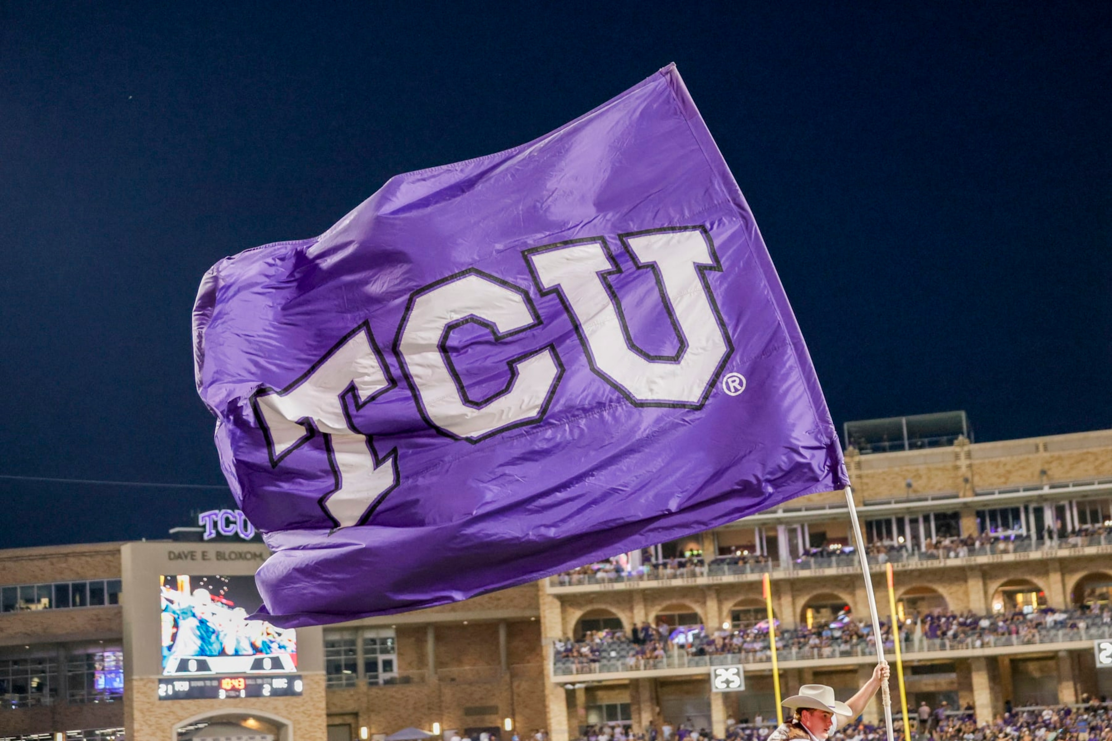 FORT WORTH, TX - SEPTEMBER 09: A TCU Horned Frogs flag flies after a touchdown during the game between the TCU Horned Frogs and the Nicholls State Colonels on September 9, 2013 at Amon G. Carter Stadium in Fort Worth, Tx. (Photo by Matthew Pearce/Icon Sportswire via Getty Images) FORT WORTH, TX - SEPTEMBER 09: A TCU Horned Frogs flag flies after a touchdown during the game between the TCU Horned Frogs and the Nicholls State Colonels on September 9, 2013 at Amon G. Carter Stadium in Fort Worth, Tx. (Photo by Matthew Pearce/Icon Sportswire via Getty Images)