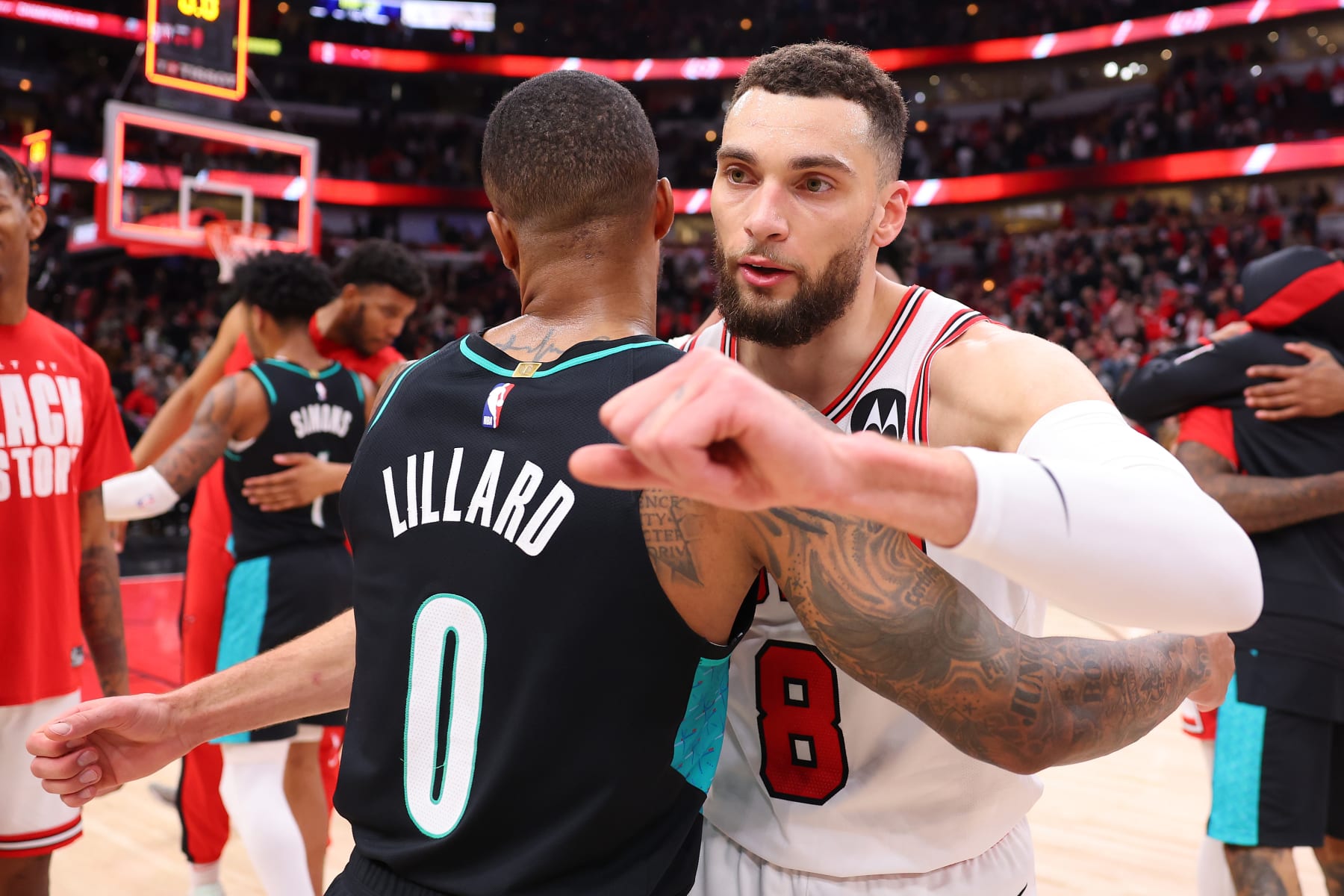CHICAGO, ILLINOIS - FEBRUARY 04: Damian Lillard #0 of the Portland Trail Blazers hugs Zach LaVine #8 of the Chicago Bulls after the game at United Center on February 04, 2023 in Chicago, Illinois. NOTE TO USER: User expressly acknowledges and agrees that, by downloading and or using this photograph, User is consenting to the terms and conditions of the Getty Images License Agreement.  (Photo by Michael Reaves/Getty Images)