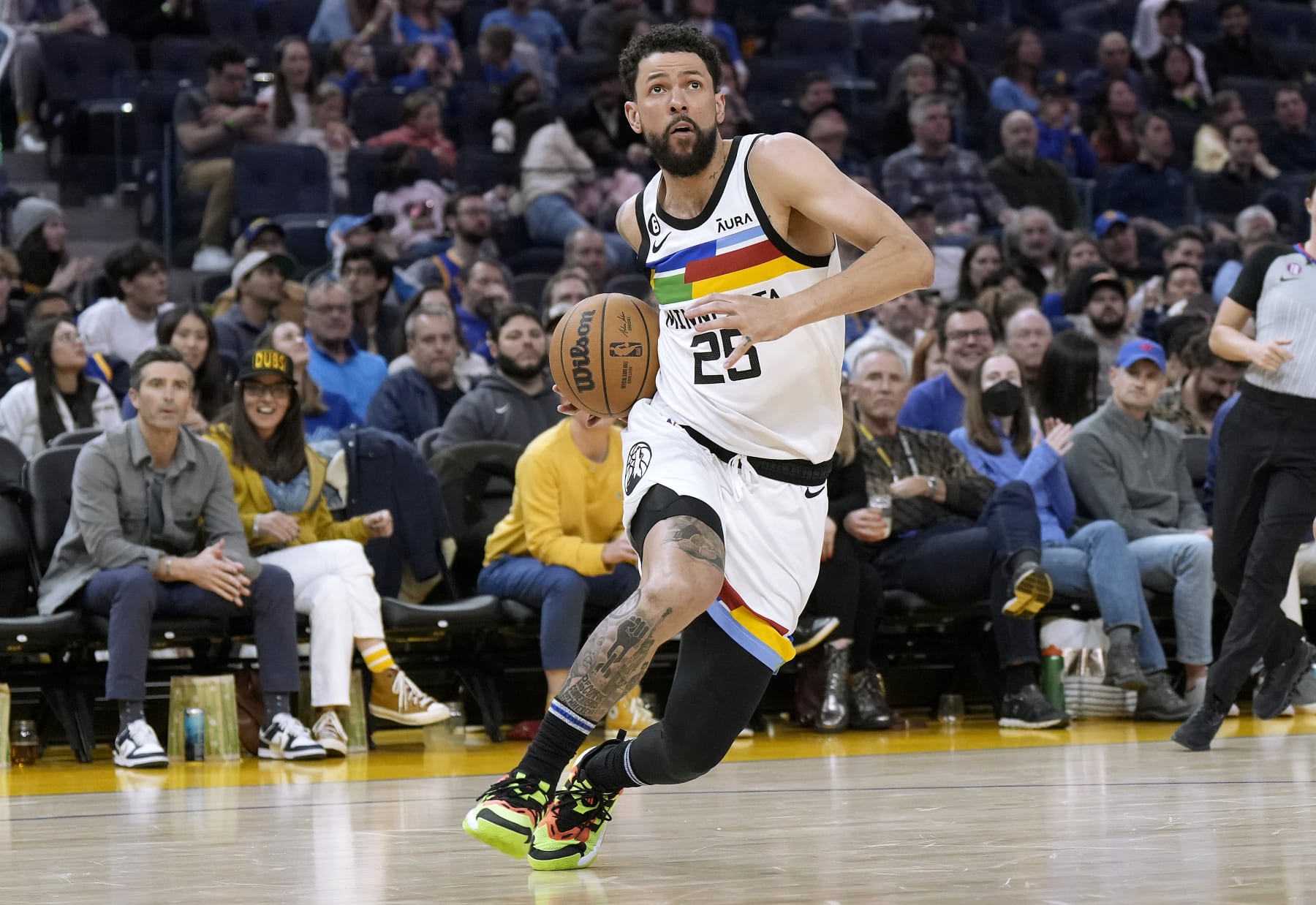 SAN FRANCISCO, CALIFORNIA - FEBRUARY 26: Austin Rivers #25 of the Minnesota Timberwolves drives to the basket against the Golden State Warriors during the second quarter of an NBA basketball game at Chase Center on February 26, 2023 in San Francisco, California. NOTE TO USER: User expressly acknowledges and agrees that, by downloading and or using this photograph, User is consenting to the terms and conditions of the Getty Images License Agreement. (Photo by Thearon W. Henderson/Getty Images)