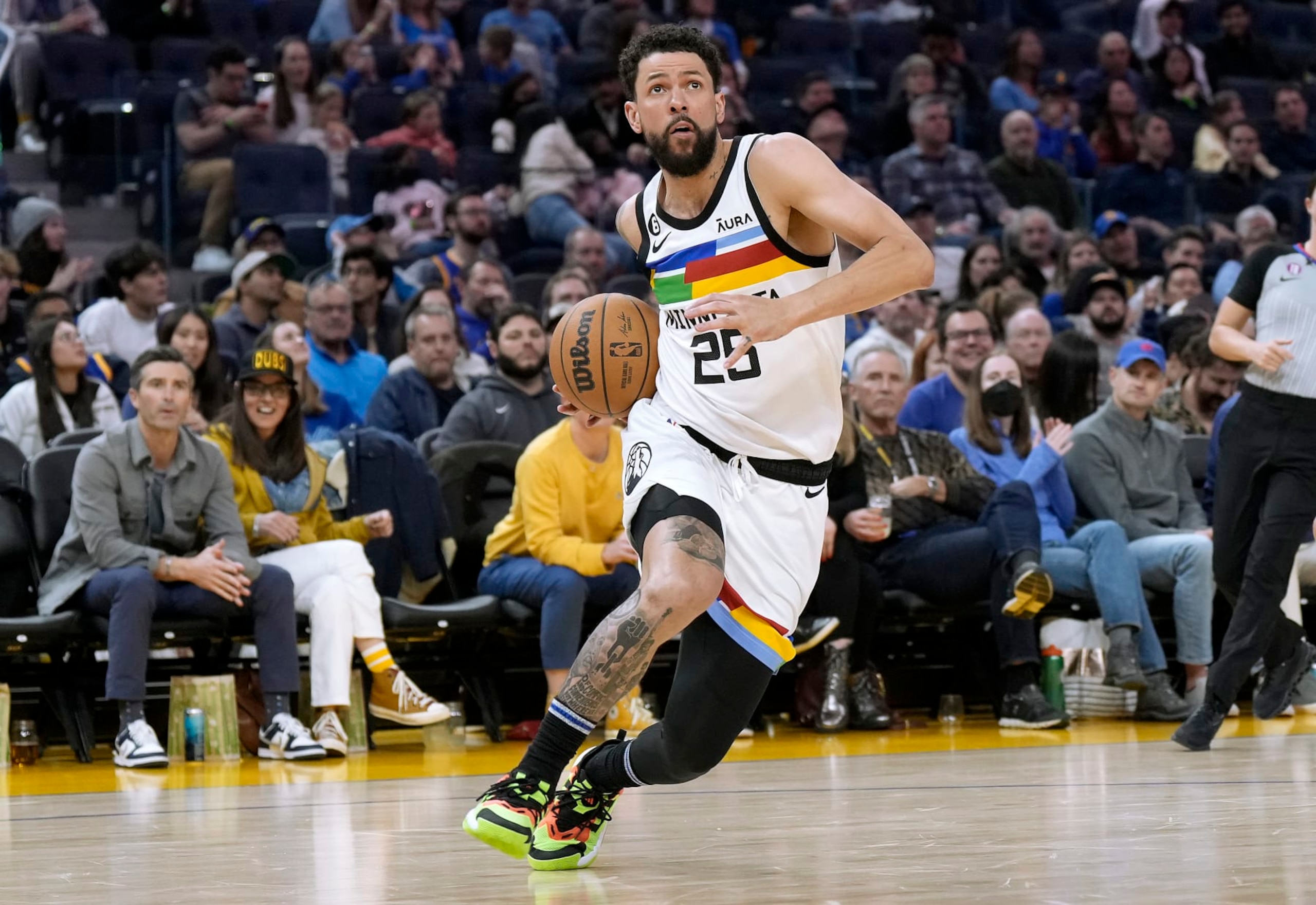 SAN FRANCISCO, CALIFORNIA - FEBRUARY 26: Austin Rivers #25 of the Minnesota Timberwolves drives to the basket against the Golden State Warriors during the second quarter of an NBA basketball game at Chase Center on February 26, 2023 in San Francisco, California. NOTE TO USER: User expressly acknowledges and agrees that, by downloading and or using this photograph, User is consenting to the terms and conditions of the Getty Images License Agreement. (Photo by Thearon W. Henderson/Getty Images)
