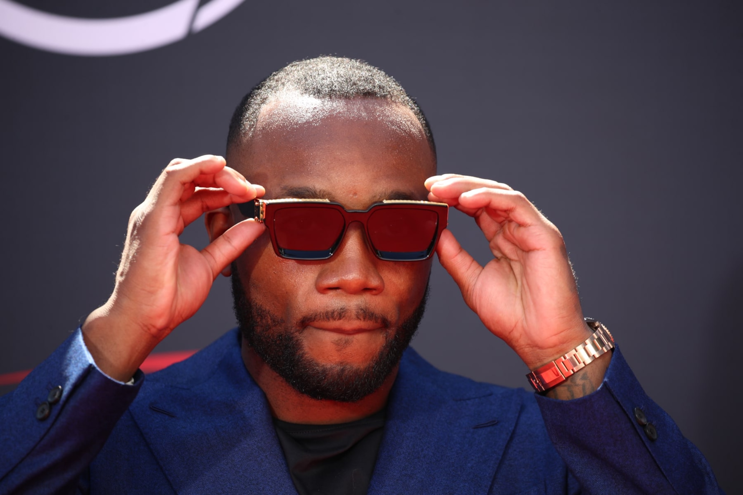 Hollywood, CA - July 12: UFC welterweight champion Leon Edwards arrives on the red carpet at the 2023 ESPY Awards in Dolby Theatre in Hollywood Wednesday, July 12, 2023.  The 2023 ESPY Awards will be held, celebrating the biggest moments in sports and athletics over the past year. Lil Wayne and H.E.R. are among those scheduled to perform. The U.S. Women's National Soccer Team will receive the Arthur Ashe Award for Courage; White Sox pitcher/cancer survivor Liam Hendriks will receive the Jimmy V Award for Perseverance; and the Buffalo Bills training staff credited with saving the life of Damar Hamlin after he suffered an on-field cardiac arrest will receive the Pat Tillman Award for Service. The list of presenters includes Dwyane Wade, Chris Paul, Mike Tyson, Peyton and Eli Manning, Travis Kelce, Quavo, Lil Rel Howery and Chris Berman.  (Allen J. Schaben / Los Angeles Times via Getty Images)