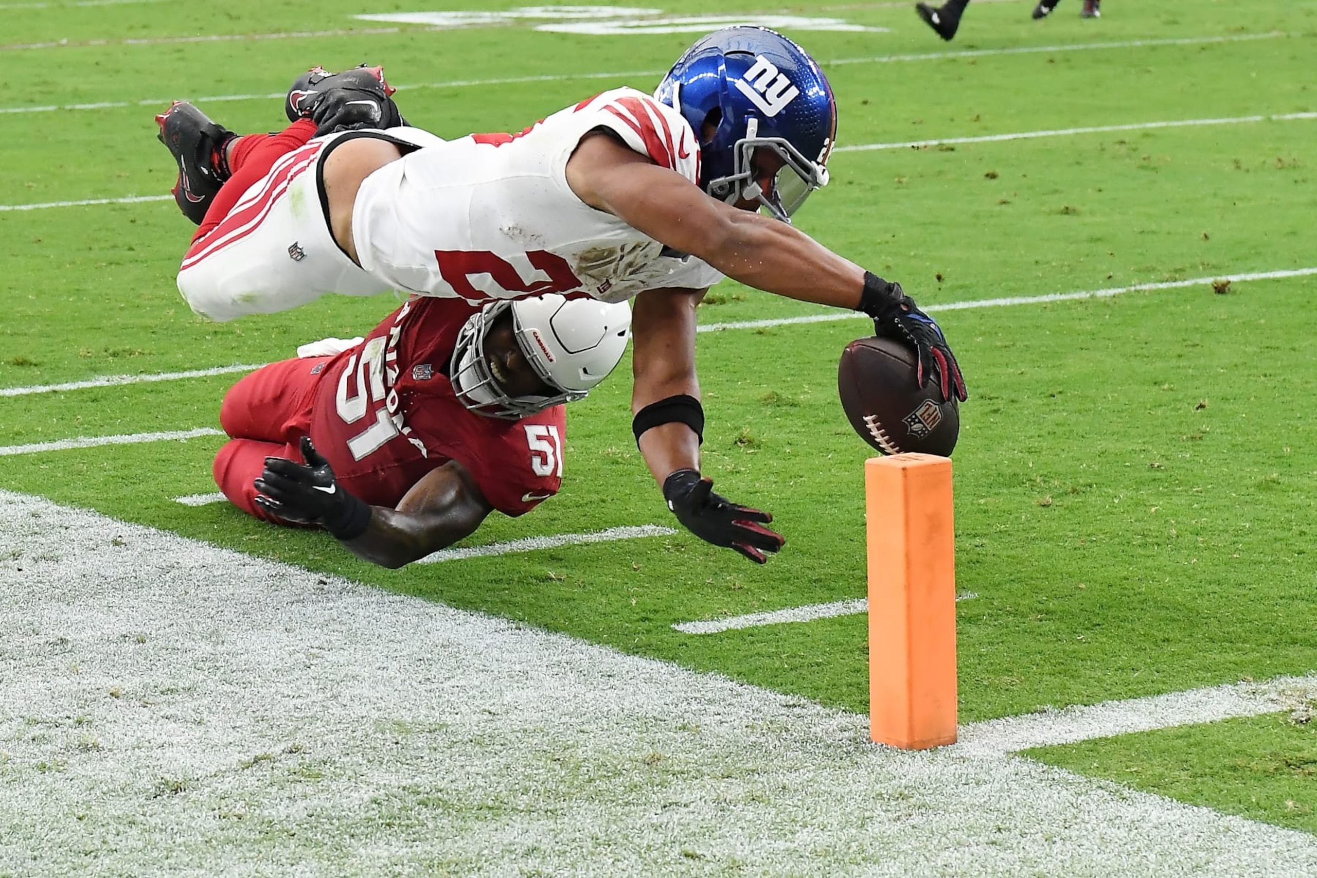 GLENDALE, ARIZONA - SEPTEMBER 17: Saquon Barkley #26 of the New York Giants scores a touchdown during the fourth quarter in the game against the Arizona Cardinals at State Farm Stadium on September 17, 2023 in Glendale, Arizona. (Photo by Norm Hall/Getty Images)