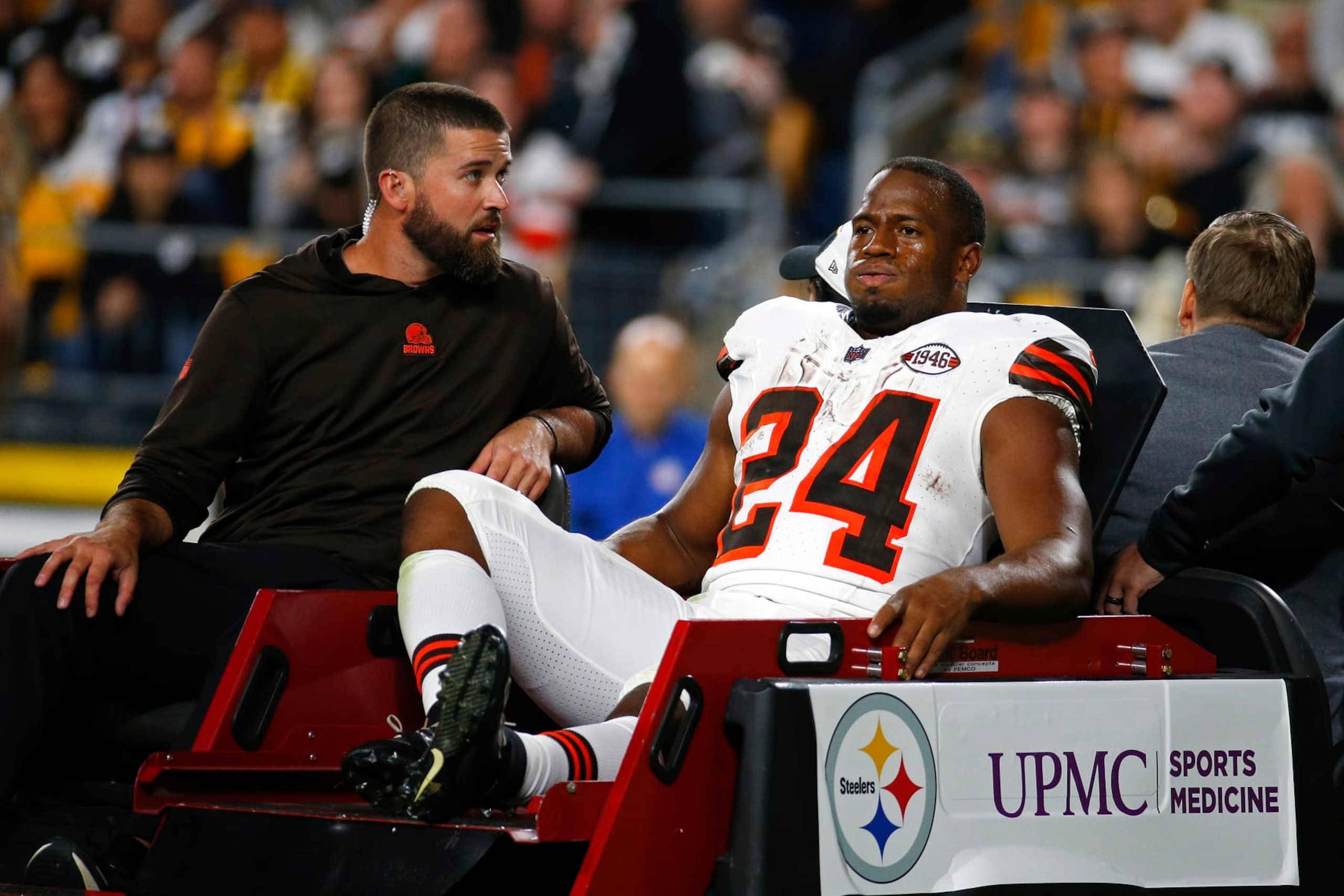 PITTSBURGH, PENNSYLVANIA - SEPTEMBER 18:  Nick Chubb #24 of the Cleveland Browns is carted off the field after sustaining a knee injury during the second quarter against the Pittsburgh Steelers at Acrisure Stadium on September 18, 2023 in Pittsburgh, Pennsylvania. (Photo by Justin K. Aller/Getty Images)