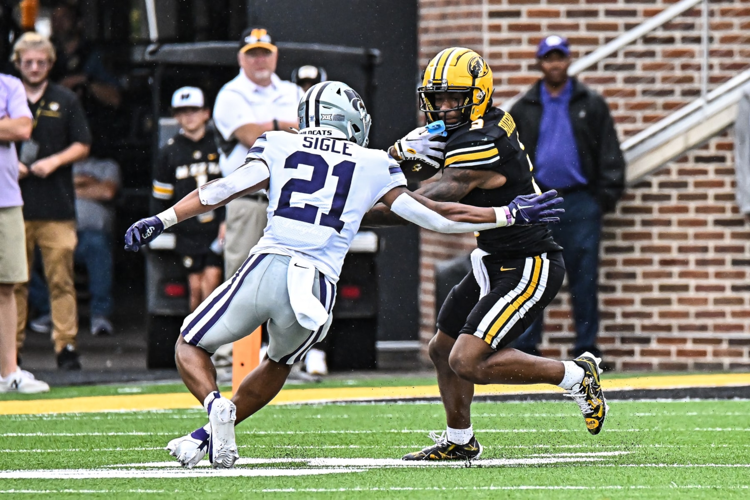 COLUMBIA, MO - SEPTEMBER 16: Missouri Tigers wide receiver Luther Burden III (3) tries to slip past the tackle attempt of Kansas State Wildcats safety Marques Sigle (21) during a non conference game between the Kansas State Wildcats and the Missouri Tigers held on Saturday Sep 16, 2023 at Faurot Field at Memorial Stadium in Columbia MO. (Photo by Rick Ulreich/Icon Sportswire via Getty Images