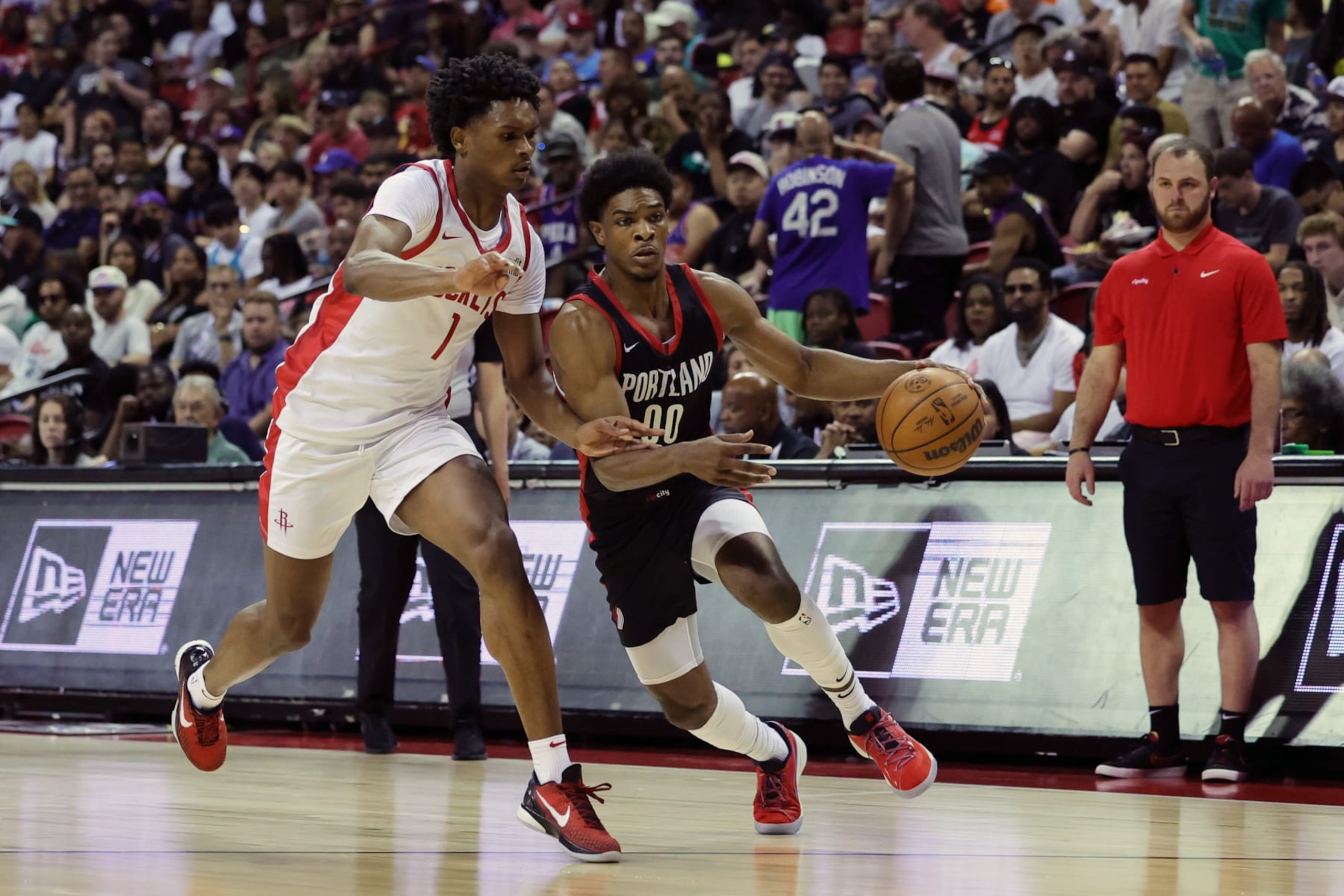 LAS VEGAS, NEVADA - JULY 07: Scoot Henderson #00 of the Portland Trail Blazers dribbles the ball against Amen Thompson #1 of the Houston Rockets during the third quarter at the Thomas & Mack Center on July 07, 2023 in Las Vegas, Nevada. (Photo by Ethan Miller/Getty Images)