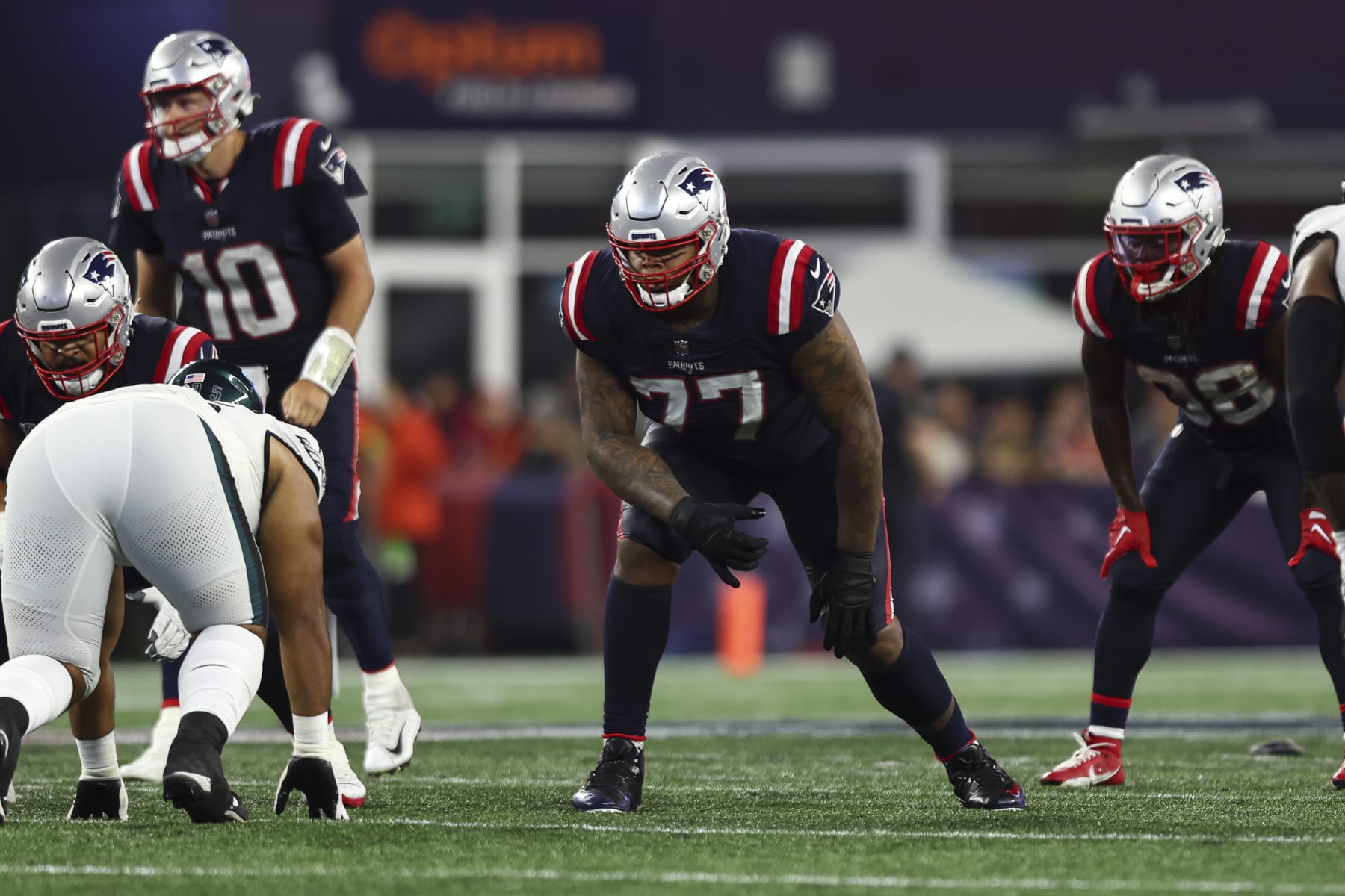 FOXBOROUGH, MA - SEPTEMBER 10: Trent Brown #77 of the New England Patriots lines up before a play during an NFL football game against the Philadelphia Eagles at Gillette Stadium on September 10, 2023 in Foxborough, Massachusetts. (Photo by Kevin Sabitus/Getty Images)