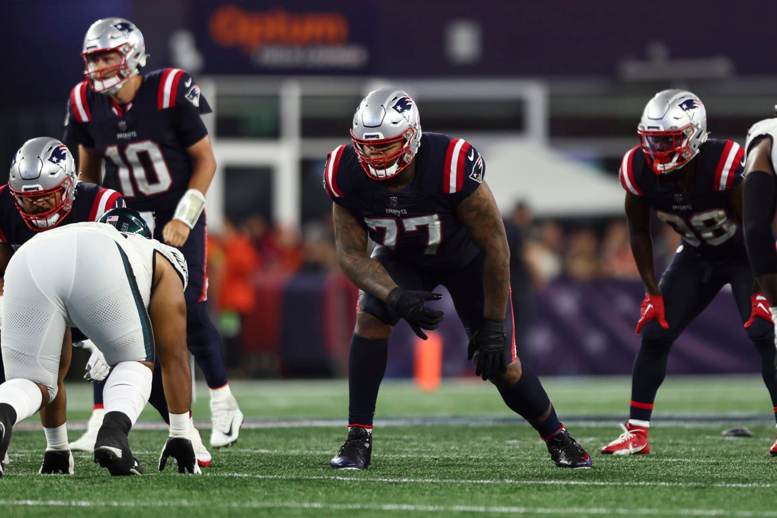 FOXBOROUGH, MA - SEPTEMBER 10: Trent Brown #77 of the New England Patriots lines up before a play during an NFL football game against the Philadelphia Eagles at Gillette Stadium on September 10, 2023 in Foxborough, Massachusetts. (Photo by Kevin Sabitus/Getty Images)