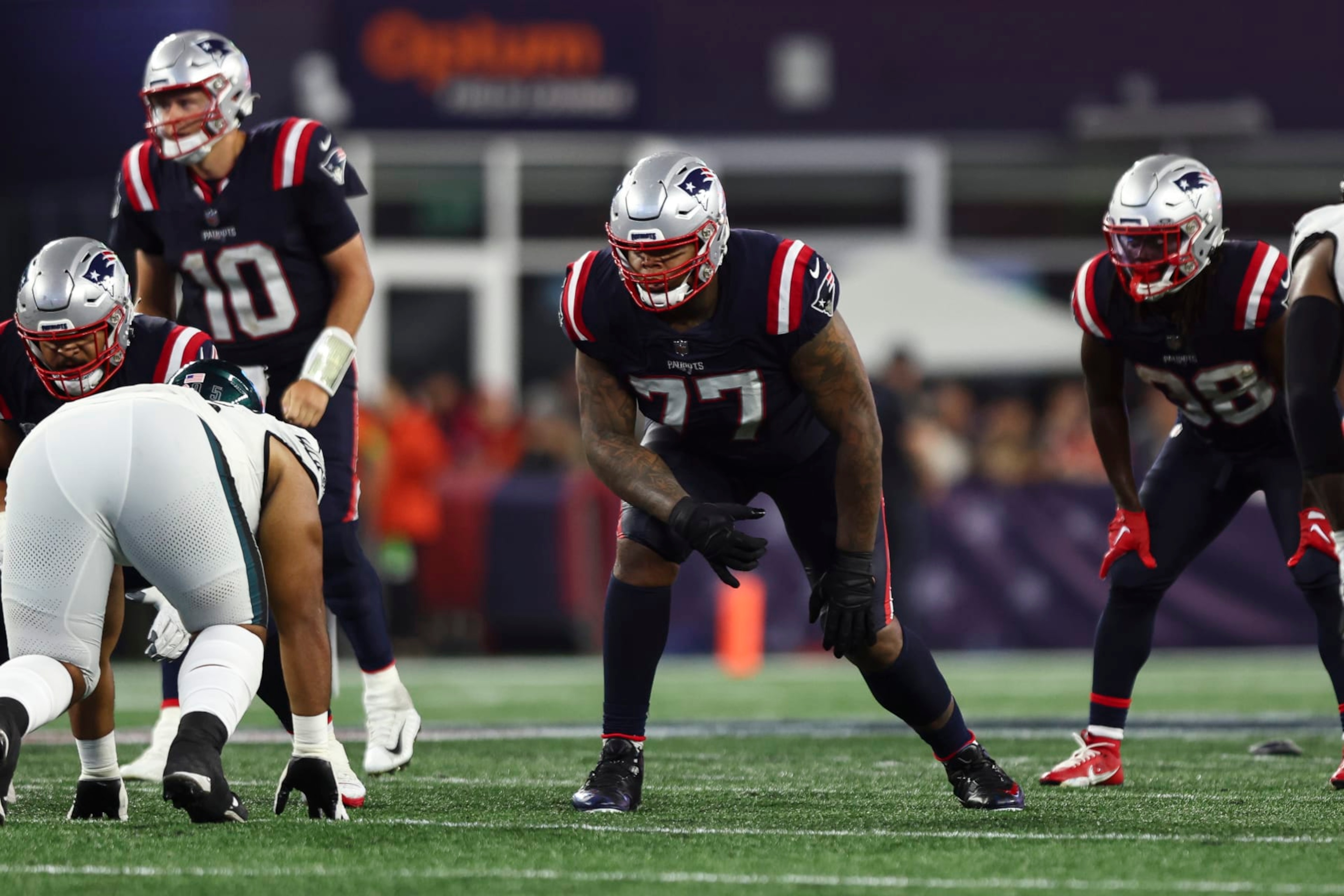 FOXBOROUGH, MA - SEPTEMBER 10: Trent Brown #77 of the New England Patriots lines up before a play during an NFL football game against the Philadelphia Eagles at Gillette Stadium on September 10, 2023 in Foxborough, Massachusetts. (Photo by Kevin Sabitus/Getty Images)
