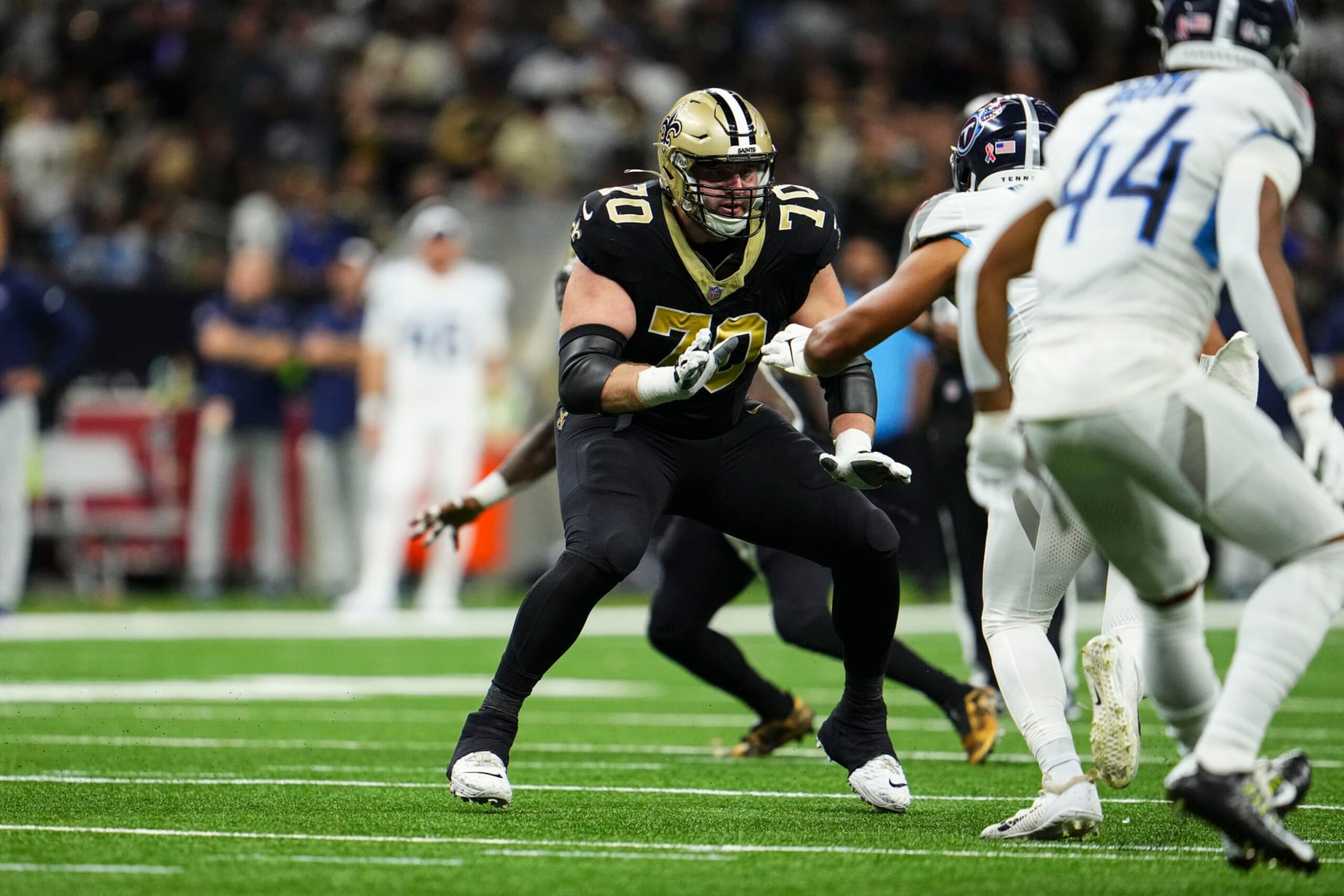 NEW ORLEANS, LA - SEPTEMBER 10: Trevor Penning #70 of the New Orleans Saints defends in coverage  at Caesars Superdome on September 10, 2023 in New Orleans, Louisiana. (Photo by Cooper Neill/Getty Images)