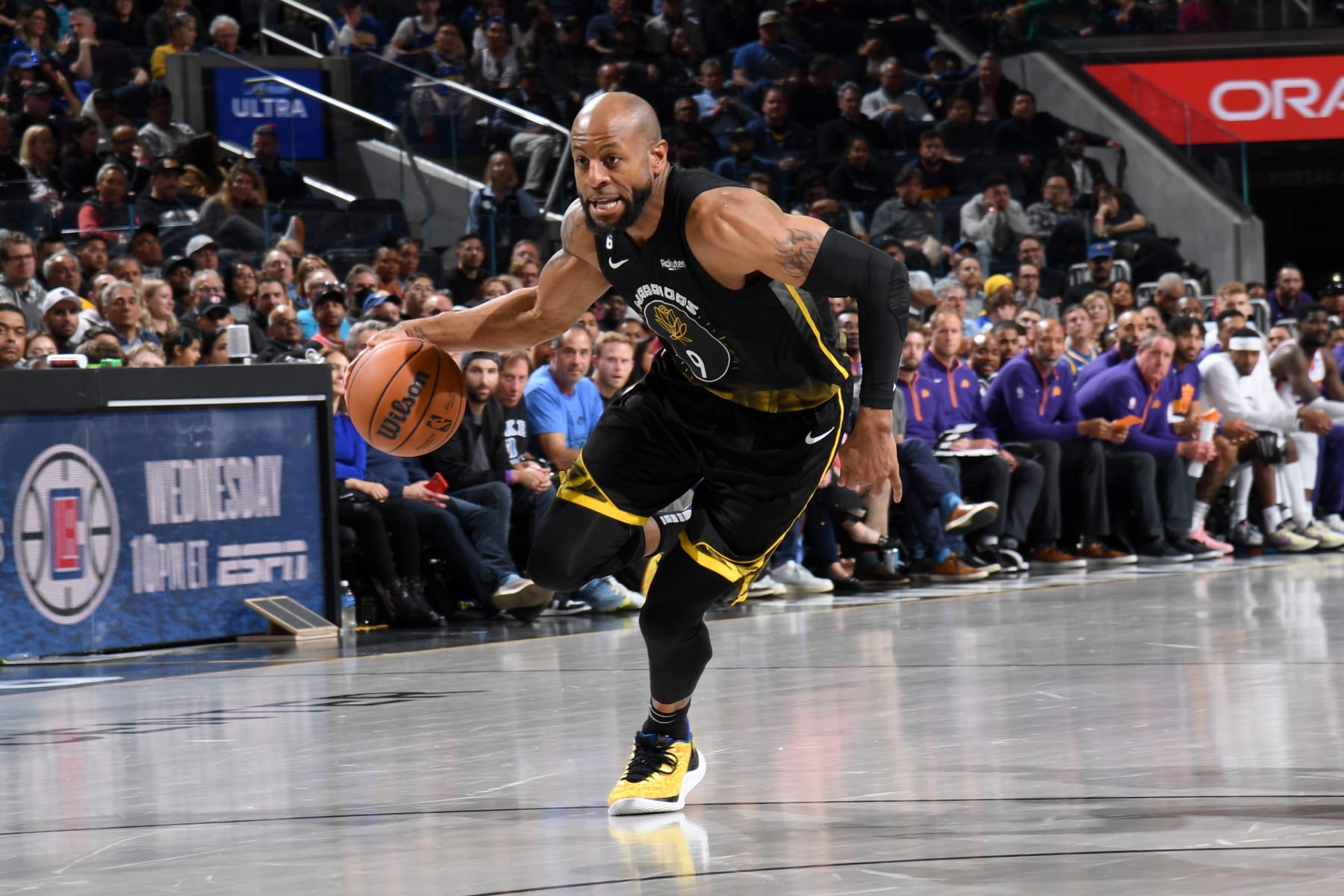 SAN FRANCISCO, CA - MARCH 13: Andre Iguodala #9 of the Golden State Warriors dribbles the ball during the game against the Phoenix Suns on March 13, 2023 at Chase Center in San Francisco, California. NOTE TO USER: User expressly acknowledges and agrees that, by downloading and or using this photograph, user is consenting to the terms and conditions of Getty Images License Agreement. Mandatory Copyright Notice: Copyright 2023 NBAE (Photo by Noah Graham/NBAE via Getty Images)