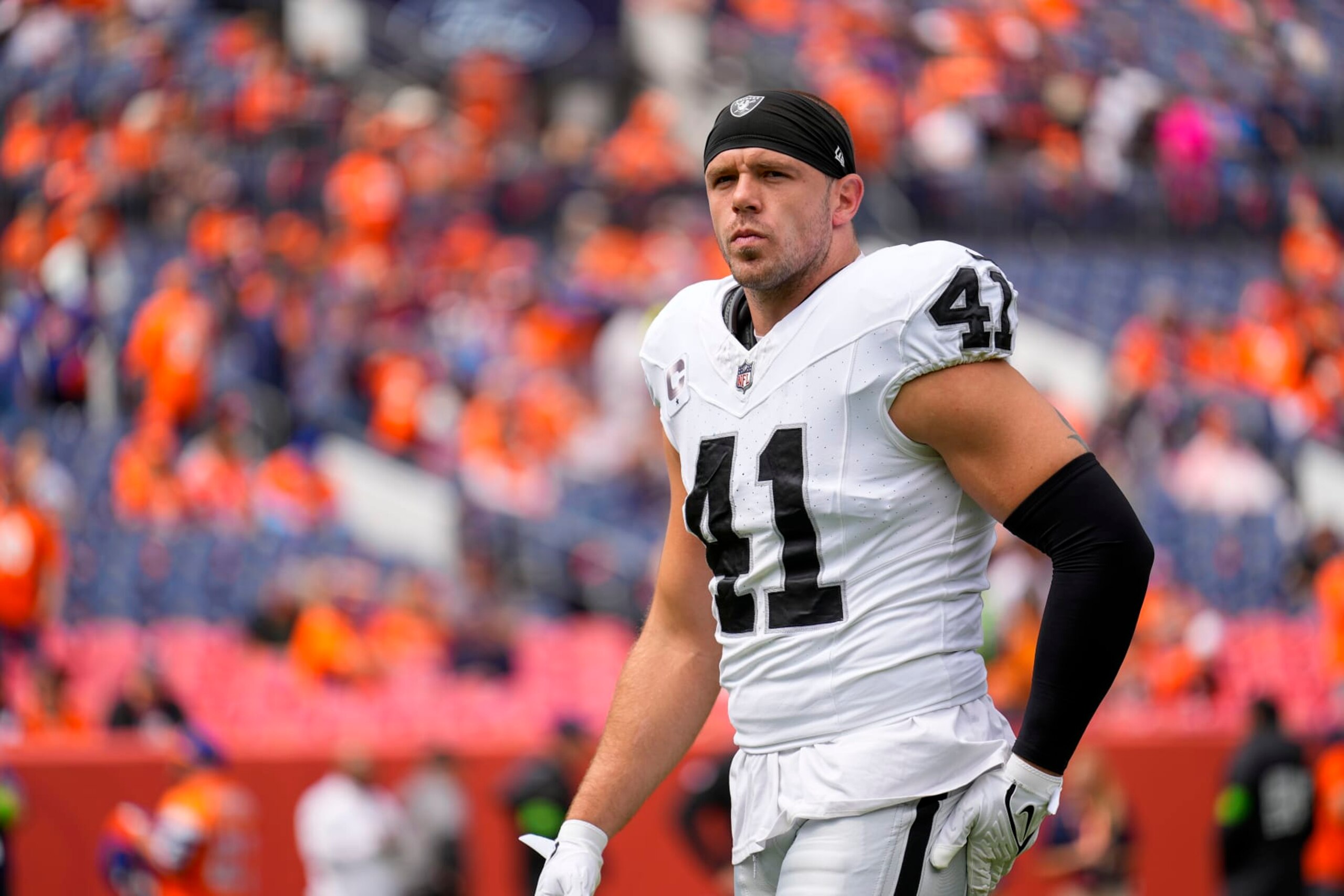 Las Vegas Raiders linebacker Robert Spillane looks on before an NFL football game against the Denver Broncos Sunday, Sept. 10, 2023, in Denver. (AP Photo/Jack Dempsey