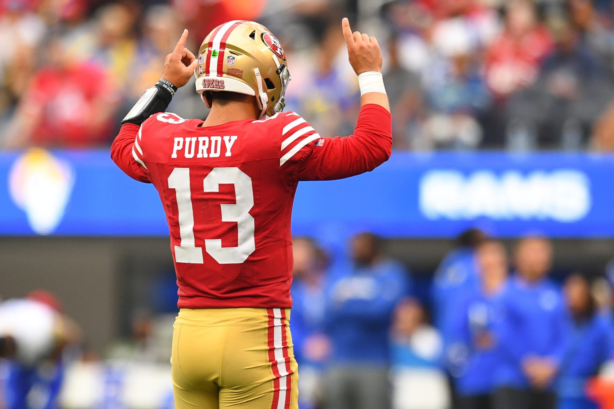 INGLEWOOD, CA - SEPTEMBER 17: San Francisco 49ers quarterback Brock Purdy (13) celebrates after a touchdown during the NFL game between the San Francisco 49ers and the Los Angeles Rams on September 17, 2023, at SoFi Stadium in Inglewood, CA. (Photo by Brian Rothmuller/Icon Sportswire via Getty Images)