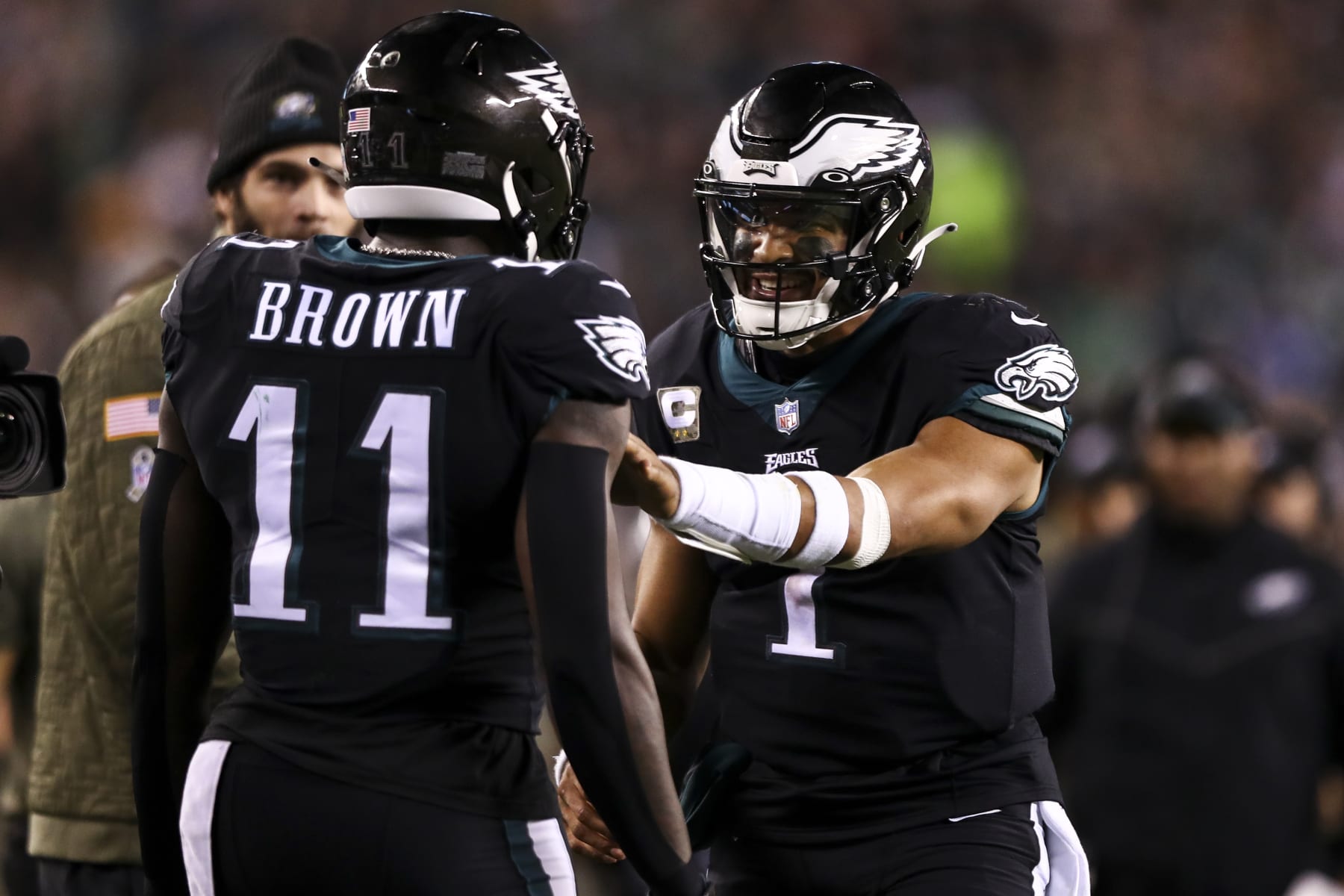PHILADELPHIA, PA - NOVEMBER 27: Jalen Hurts #1 of the Philadelphia Eagles celebrates with A.J. Brown #11 after scoring a touchdown during the third quarter of an NFL football game against the Green Bay Packers at Lincoln Financial Field on November 27, 2022 in Philadelphia, Pennsylvania. (Photo by Kevin Sabitus/Getty Images)
