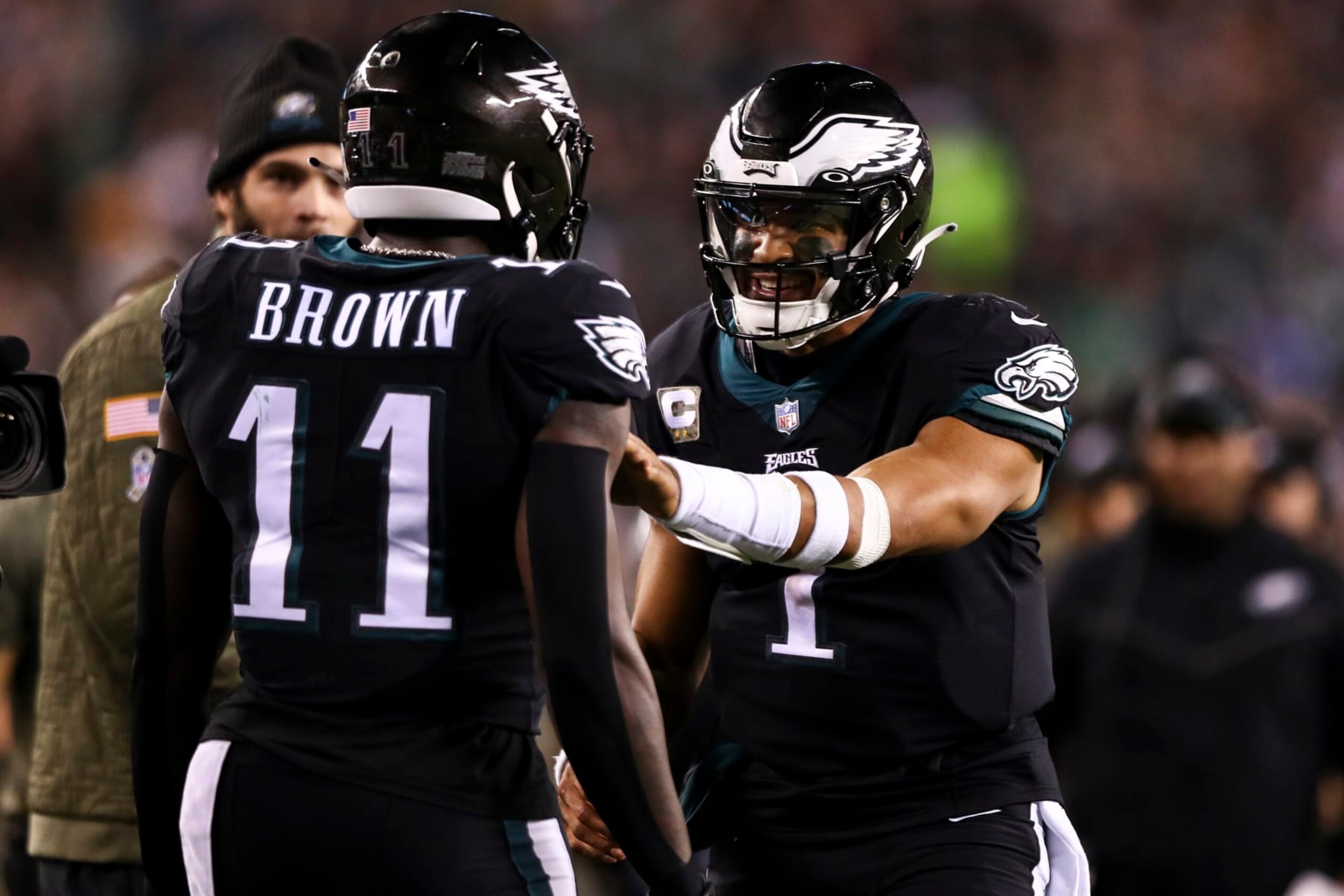 PHILADELPHIA, PA - NOVEMBER 27: Jalen Hurts #1 of the Philadelphia Eagles celebrates with A.J. Brown #11 after scoring a touchdown during the third quarter of an NFL football game against the Green Bay Packers at Lincoln Financial Field on November 27, 2022 in Philadelphia, Pennsylvania. (Photo by Kevin Sabitus/Getty Images)