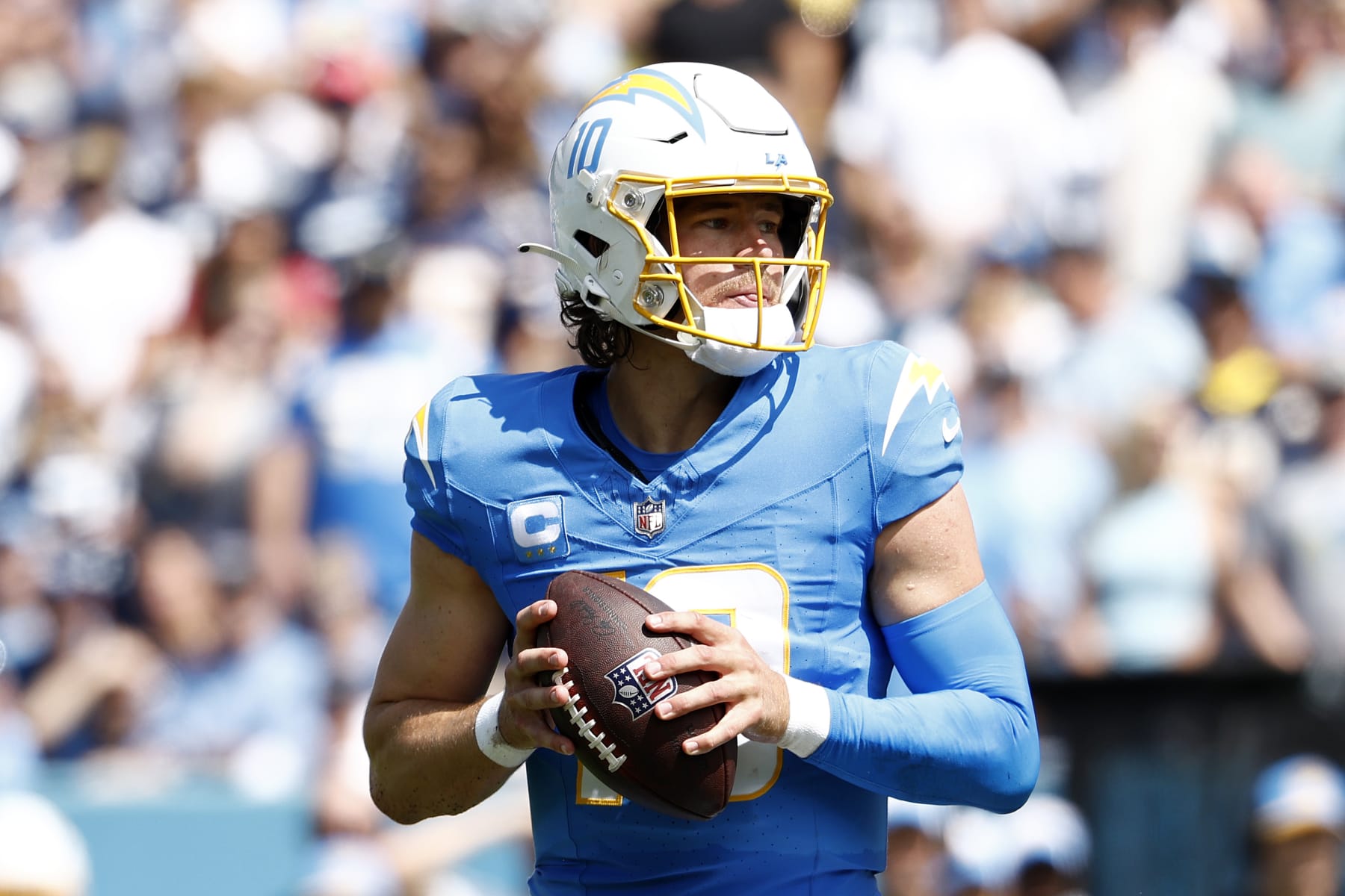 NASHVILLE, TENNESSEE - SEPTEMBER 17: Justin Herbert #10 of the Los Angeles Chargers attempts a pass during the second quarter against the Tennessee Titans at Nissan Stadium on September 17, 2023 in Nashville, Tennessee. (Photo by Johnnie Izquierdo/Getty Images)