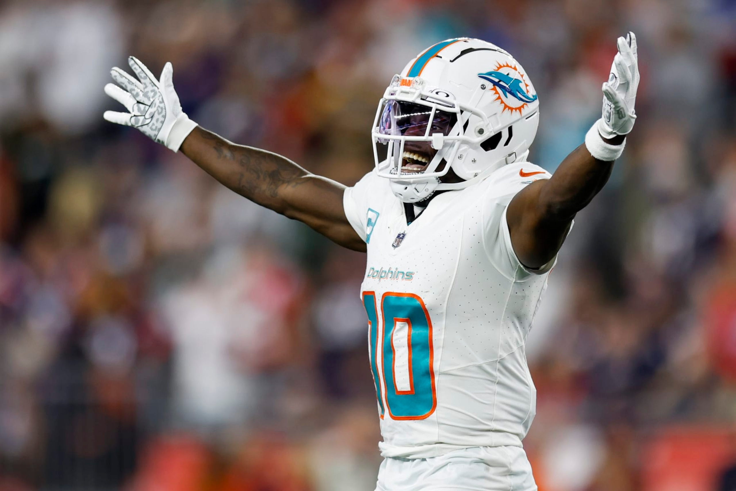 Miami Dolphins wide receiver Tyreek Hill (10) reacts after a touchdown during the second half of an NFL football game against the New England Patriots on Sunday, Sept. 17, 2023, in Foxborough, Mass. (AP Photo/Greg M. Cooper) Miami Dolphins wide receiver Tyreek Hill (10) reacts after a touchdown during the second half of an NFL football game against the New England Patriots on Sunday, Sept. 17, 2023, in Foxborough, Mass. (AP Photo/Greg M. Cooper)