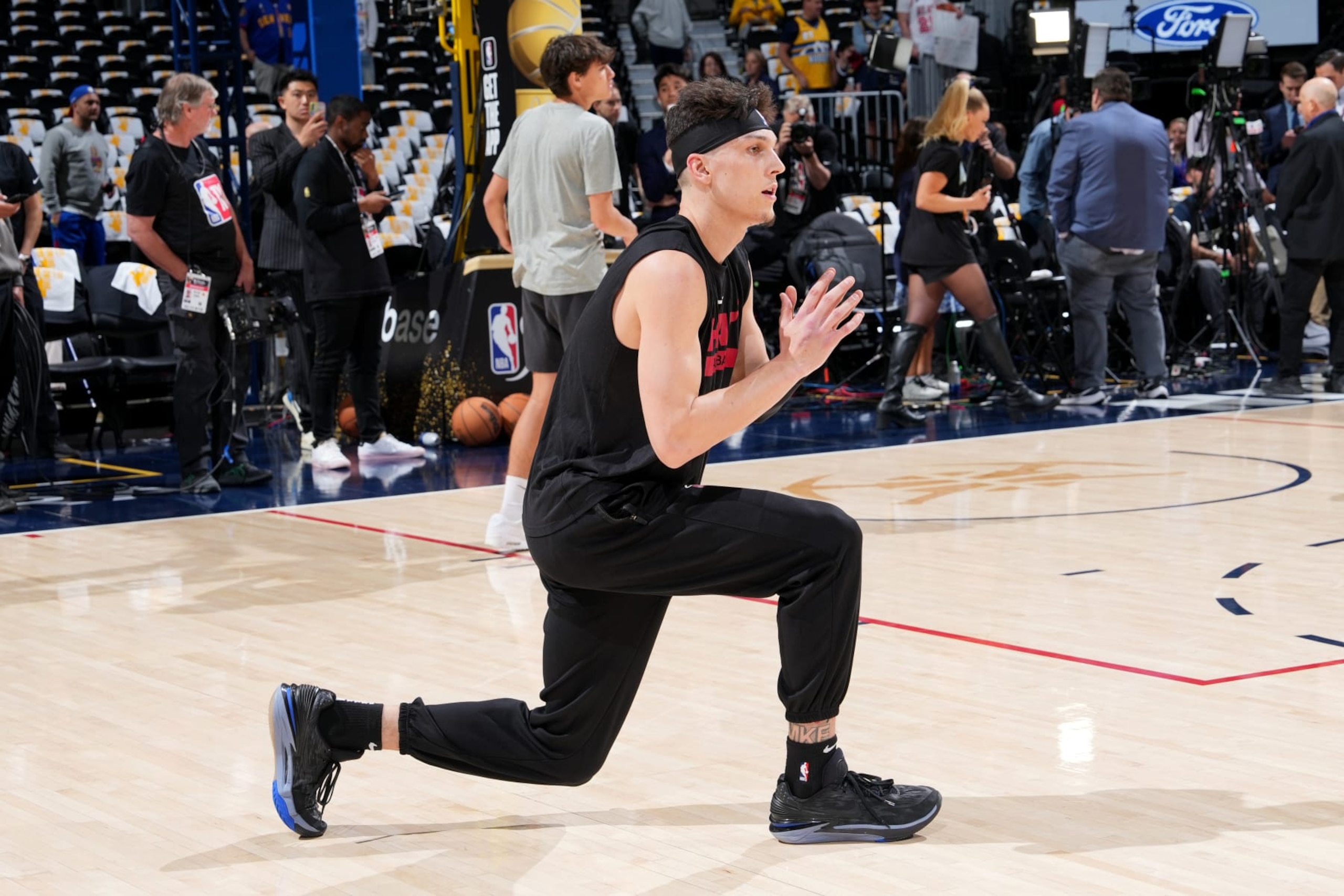 DENVER, CO - JUNE 12: Tyler Herro #14 of the Miami Heat warms up before Game Five of the 2023 NBA Finals against the Denver Nuggets on June 12, 2023 at Ball Arena in Denver, Colorado. NOTE TO USER: User expressly acknowledges and agrees that, by downloading and or using this Photograph, user is consenting to the terms and conditions of the Getty Images License Agreement. Mandatory Copyright Notice: Copyright 2023 NBAE (Photo by Jesse D. Garrabrant/NBAE via Getty Images)