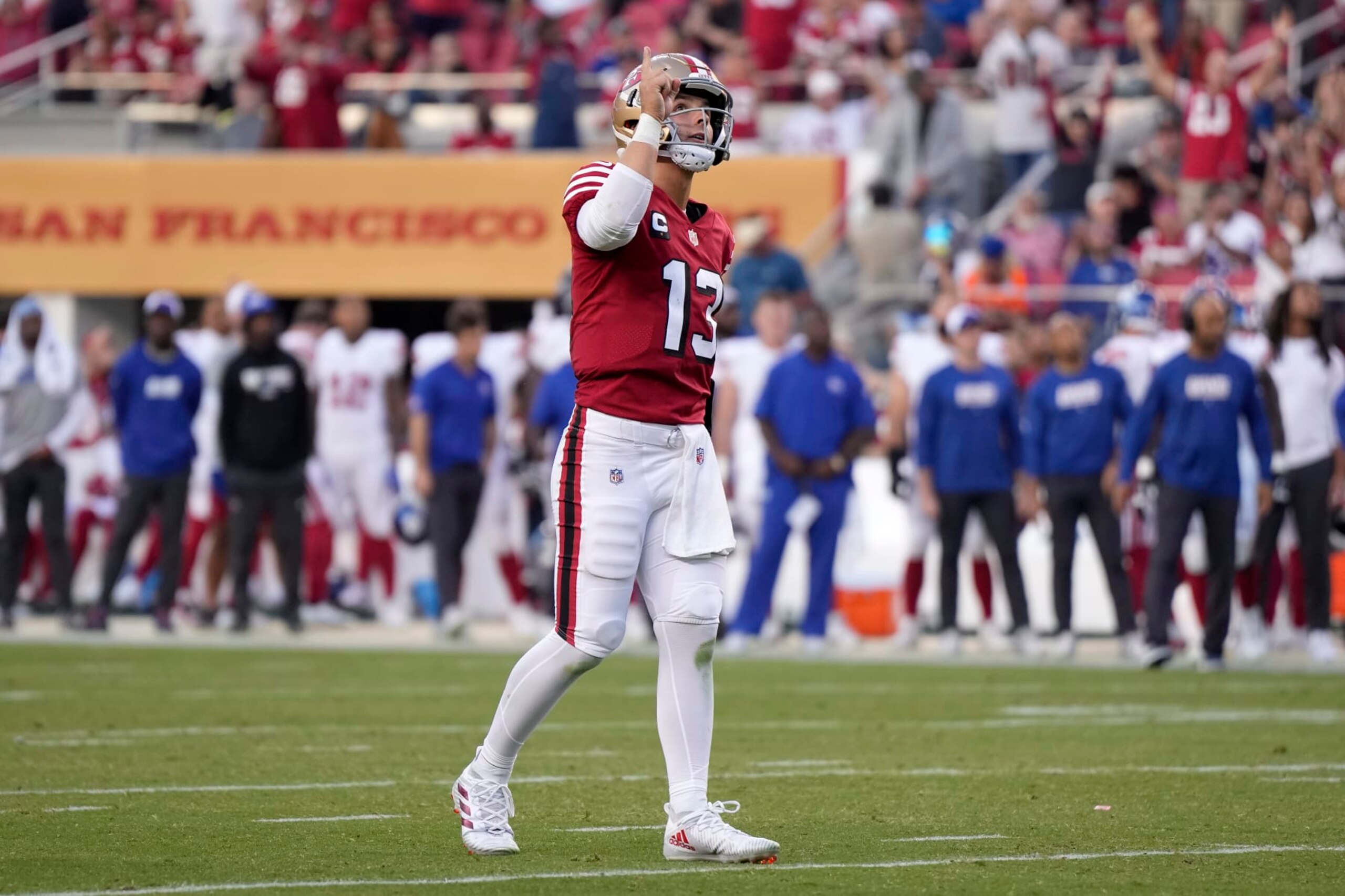 SANTA CLARA, CALIFORNIA - SEPTEMBER 21: Brock Purdy #13 of the San Francisco 49ers celebrates a touchdown scored by Christian McCaffrey #23 against the New York Giants during the second quarter in the game at Levi's Stadium on September 21, 2023 in Santa Clara, California. (Photo by Thearon W. Henderson/Getty Images)