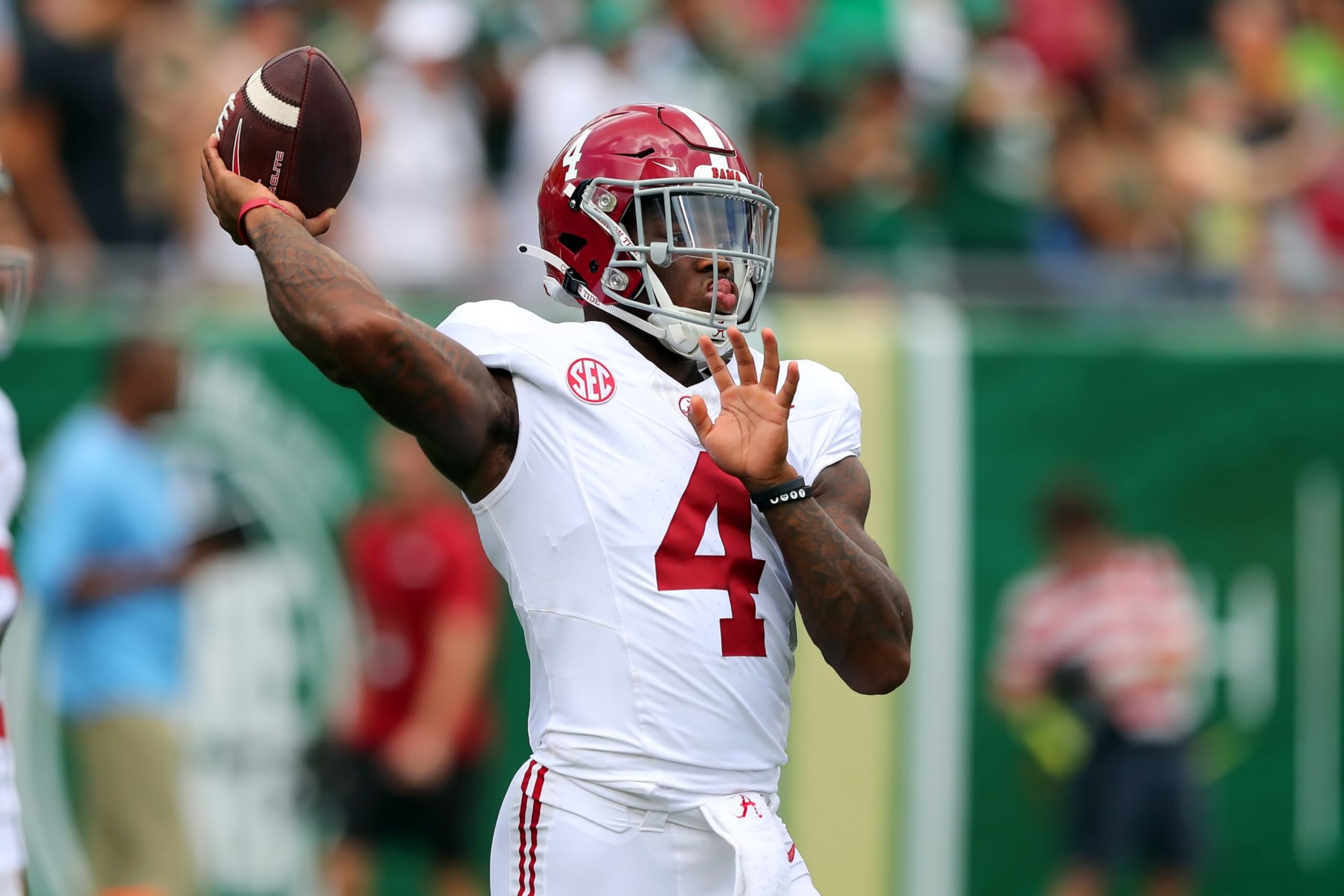 TAMPA, FL - SEPTEMBER 16: Alabama Crimson Tide Quarterback Jalen Milroe (4) warms up before the College Football game between the Alabama Crimson Tide and the South Florida Bulls on September 16, 2023 at Raymond James Stadium in Tampa, FL. (Photo by Cliff Welch/Icon Sportswire via Getty Images)
