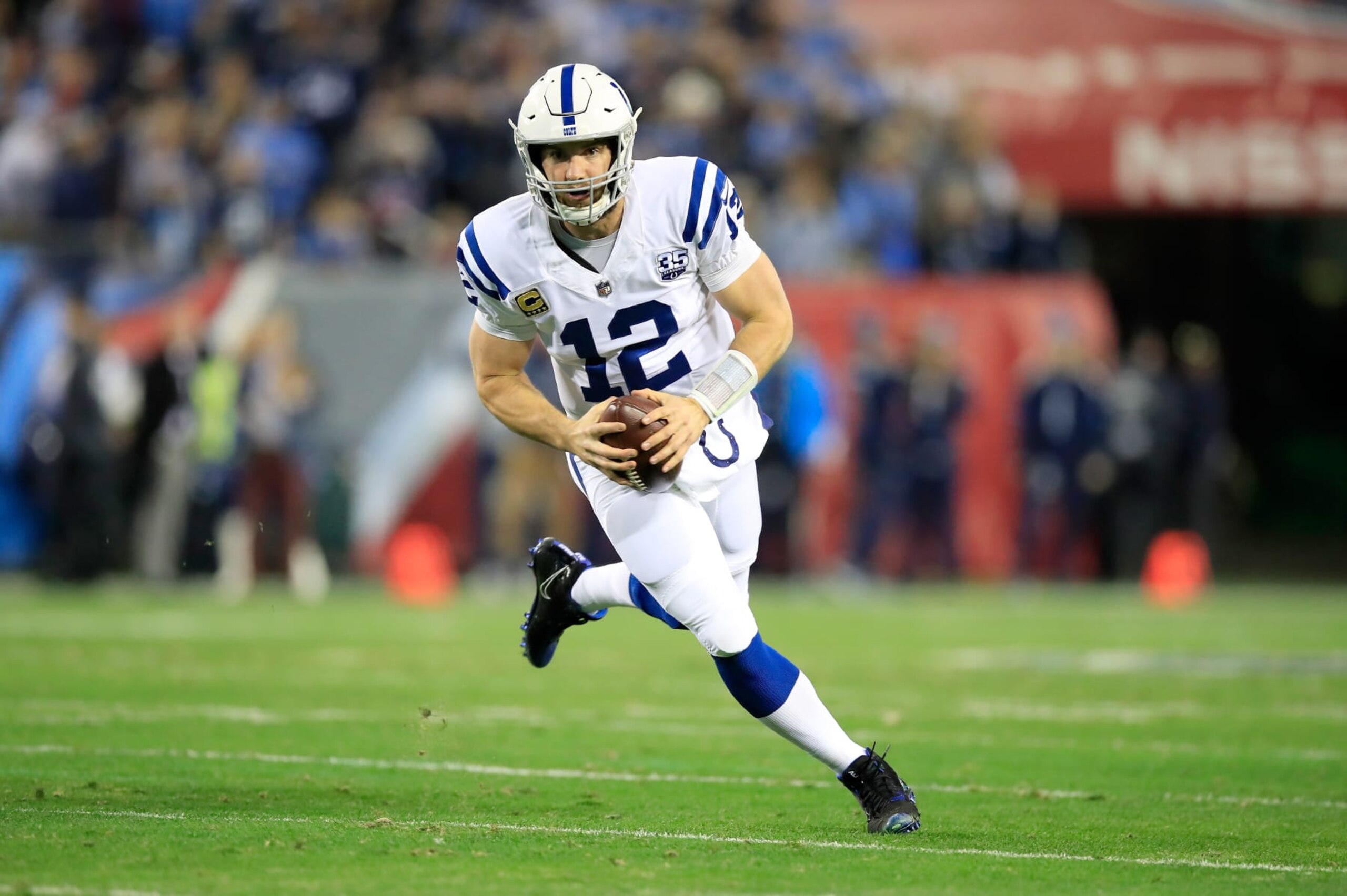 NASHVILLE, TN - DECEMBER 30:  Andrew Luck #12 of the Indianapolis Colts runs with the ball against the Tennessee Titans at Nissan Stadium on December 30, 2018 in Nashville, Tennessee.  (Photo by Andy Lyons/Getty Images)