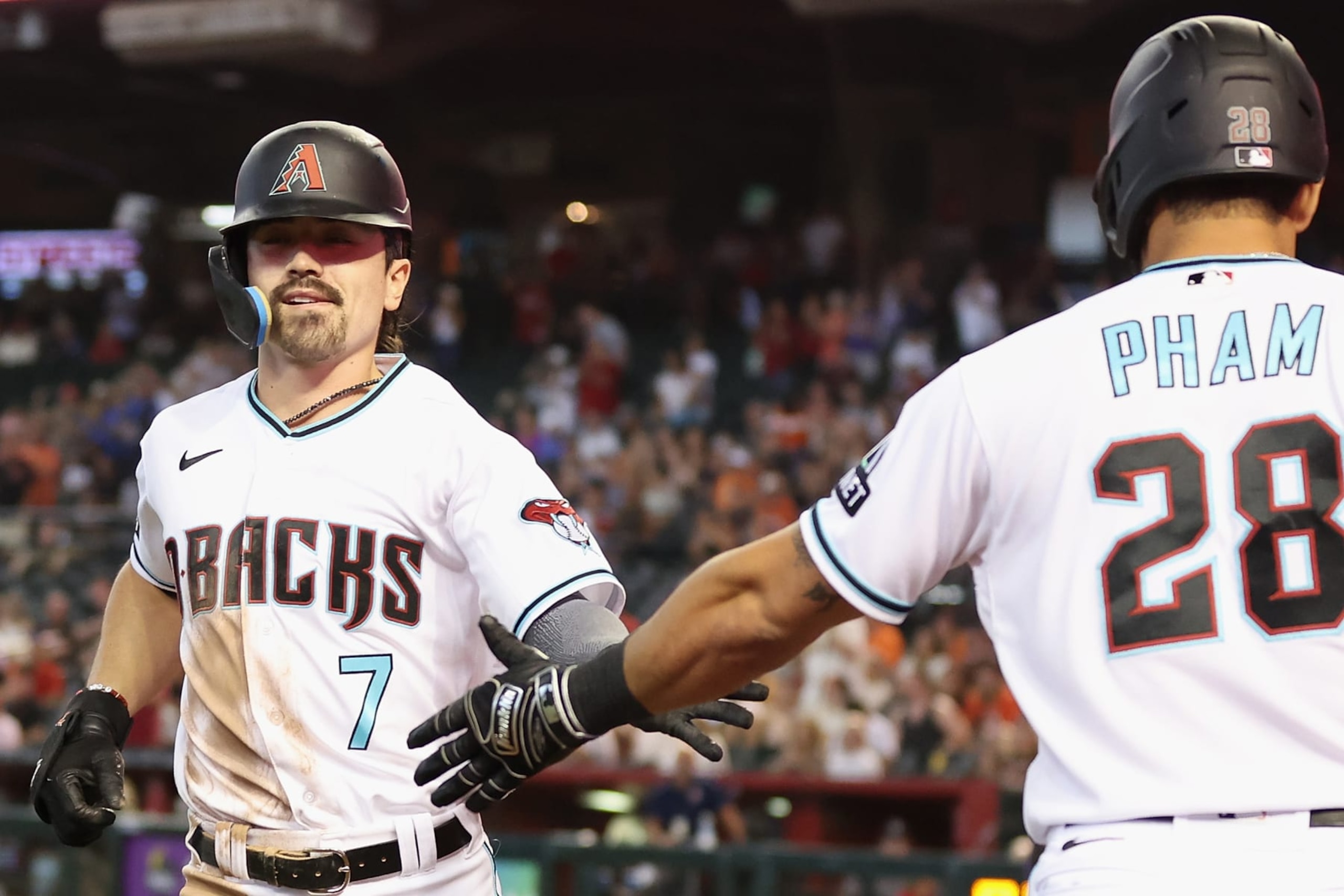 Corbin Caroll (L) and Tommy Pham (R)